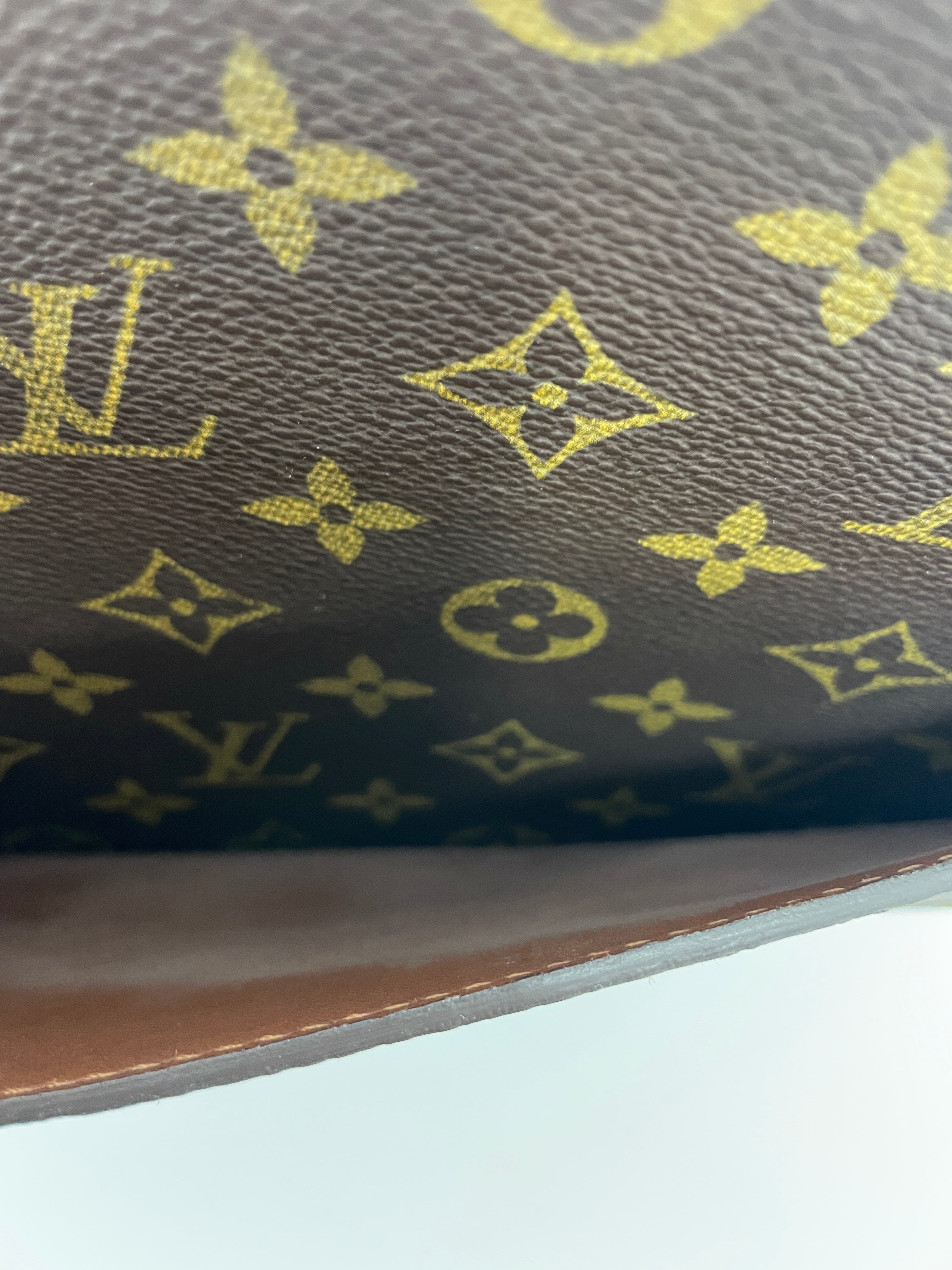 Louis Vuitton Pochette Dome Clutch Used