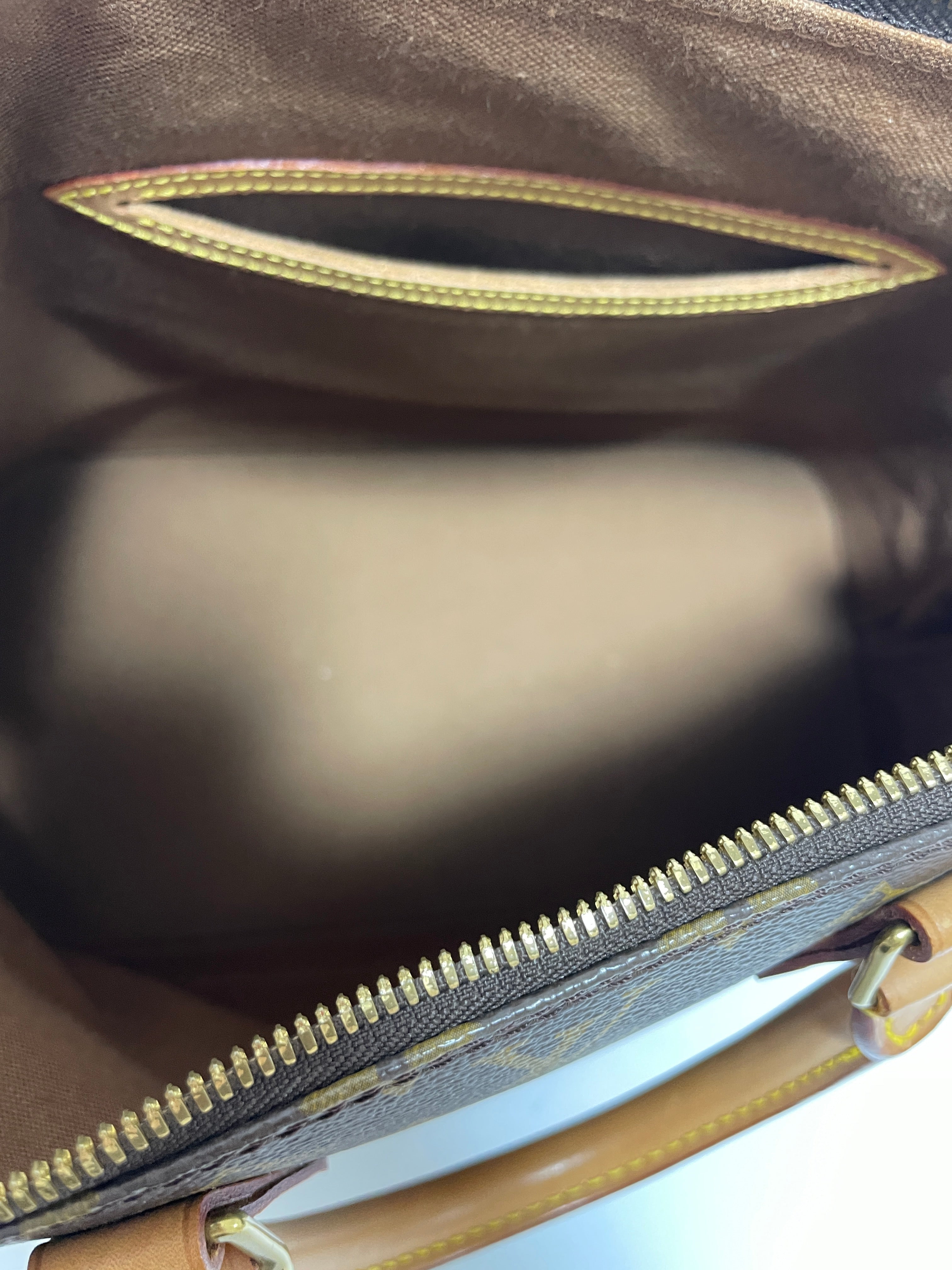 Louis Vuitton Alma PM Handbag Used