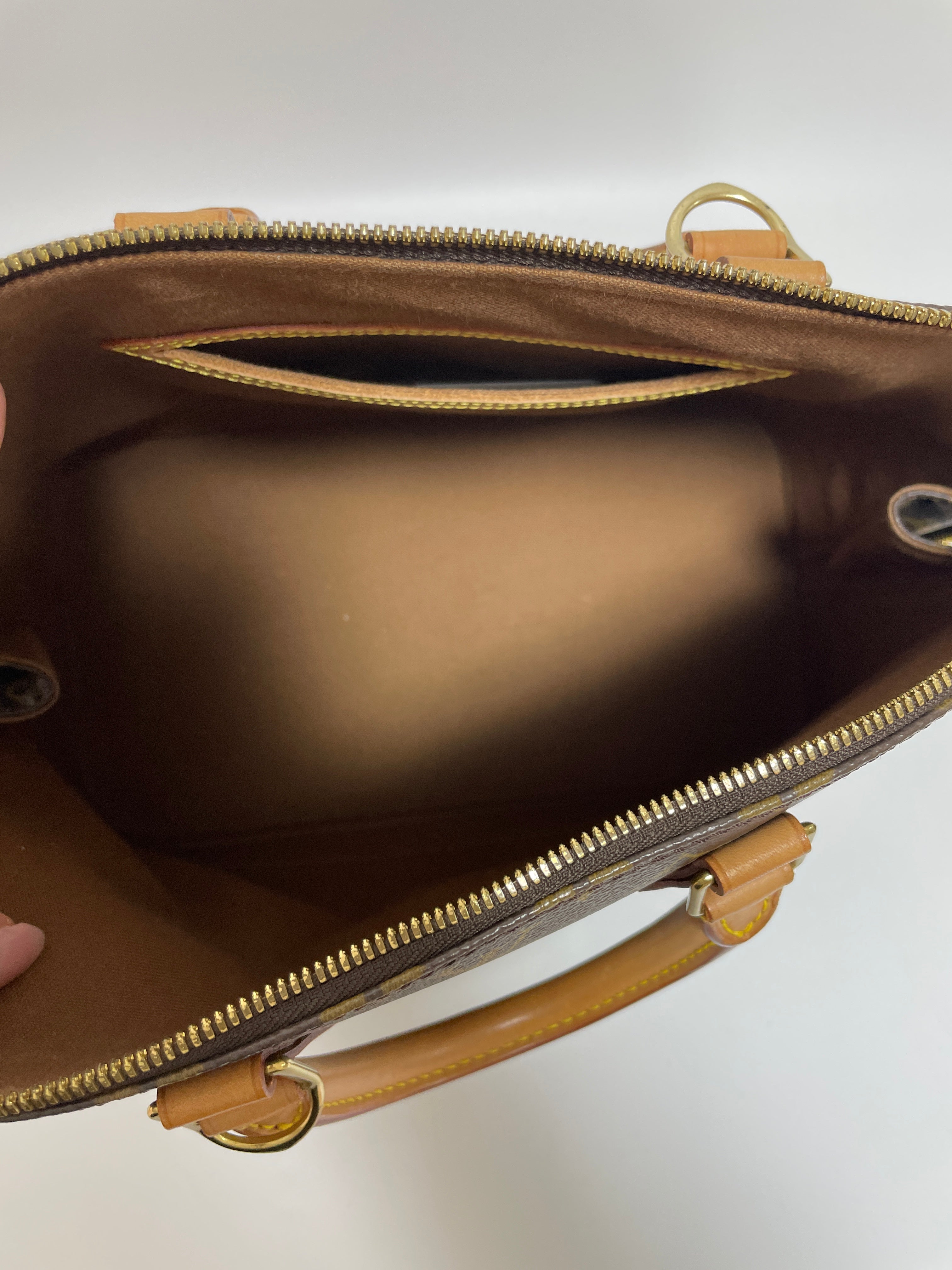 Louis Vuitton Alma PM Handbag Used