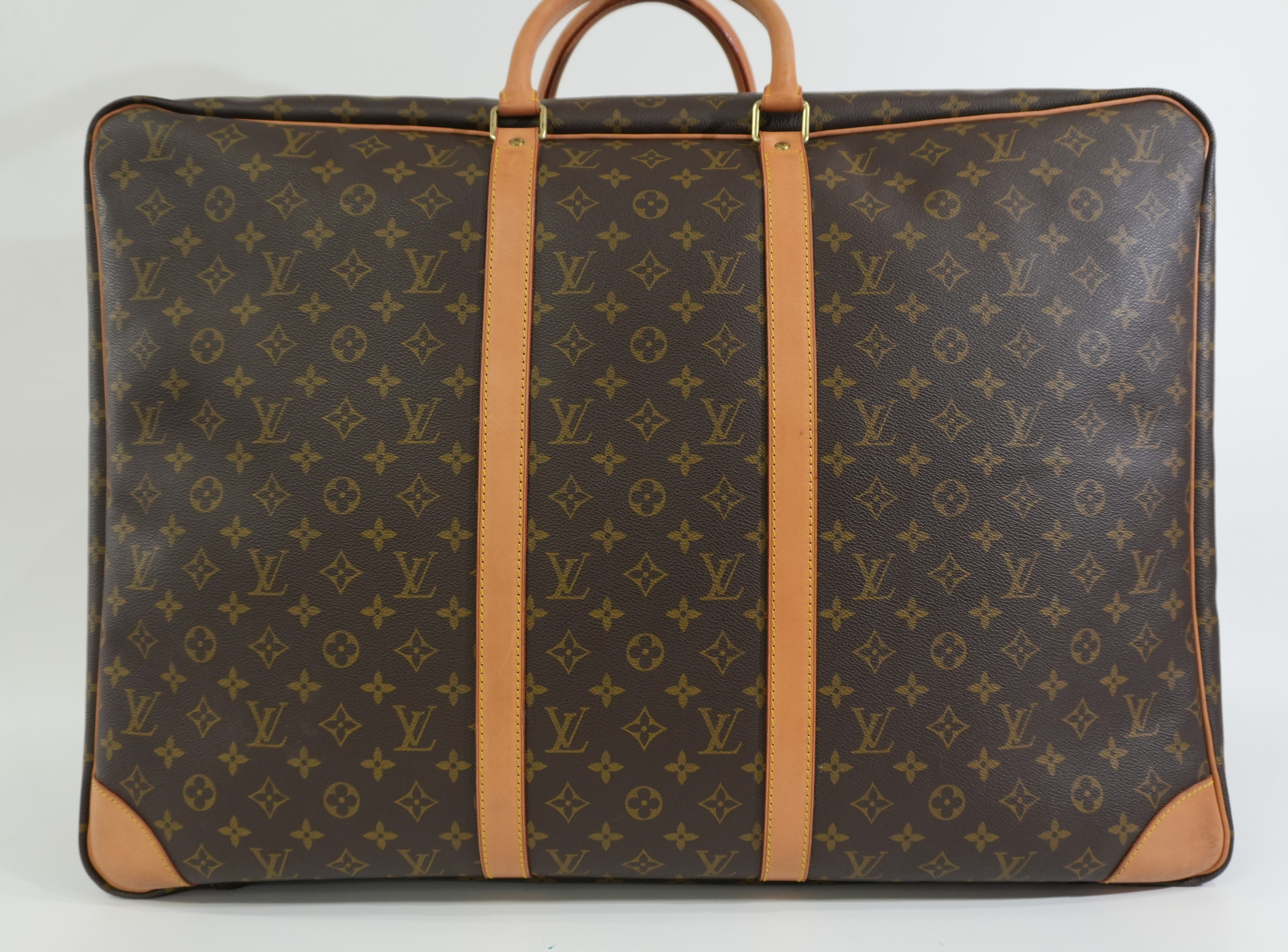 Pre-owned Louis Vuitton Monogram Sirius Travel Bag