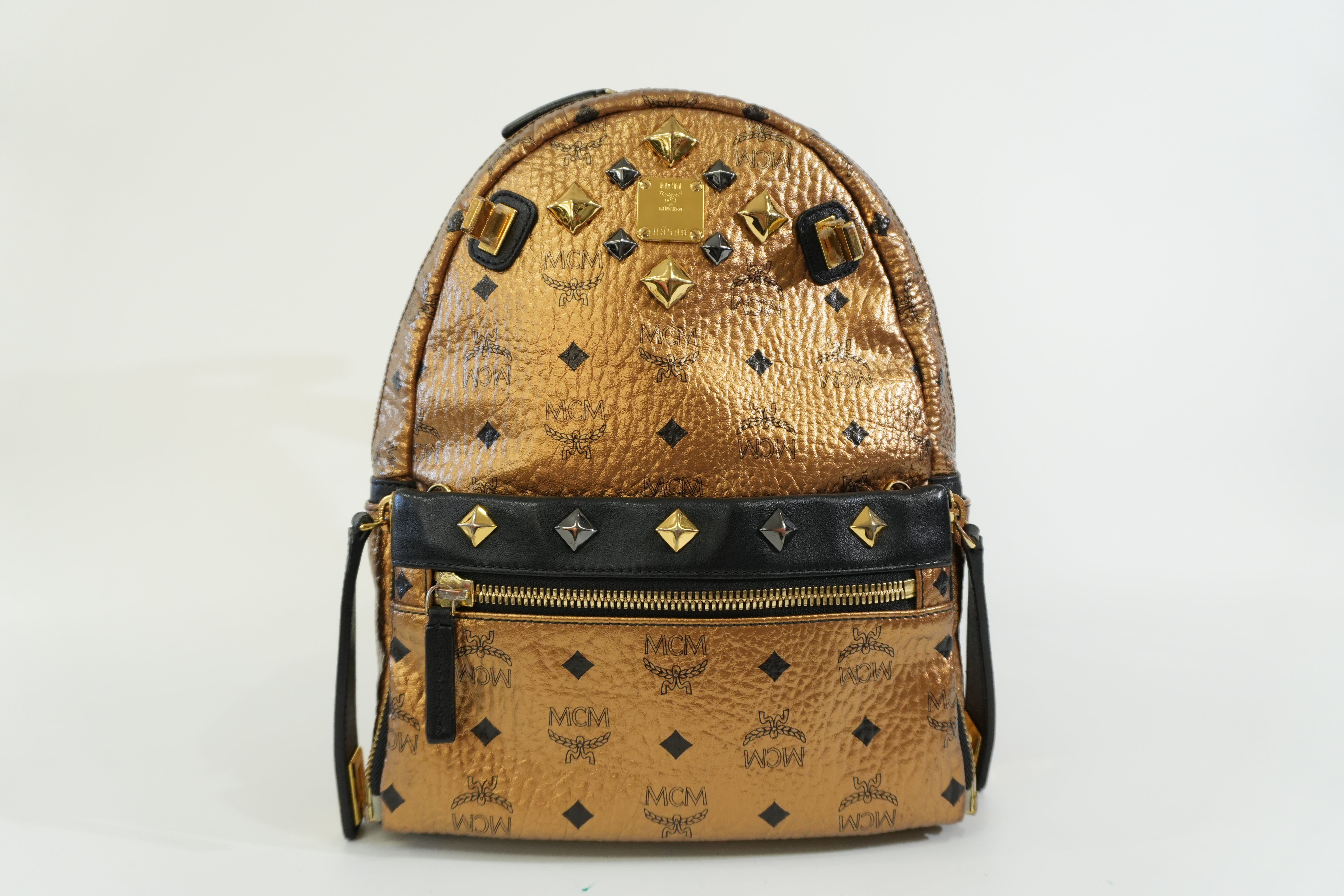 Pre-owned MCM Metallic Backpack with Detachable Pouch Gold
