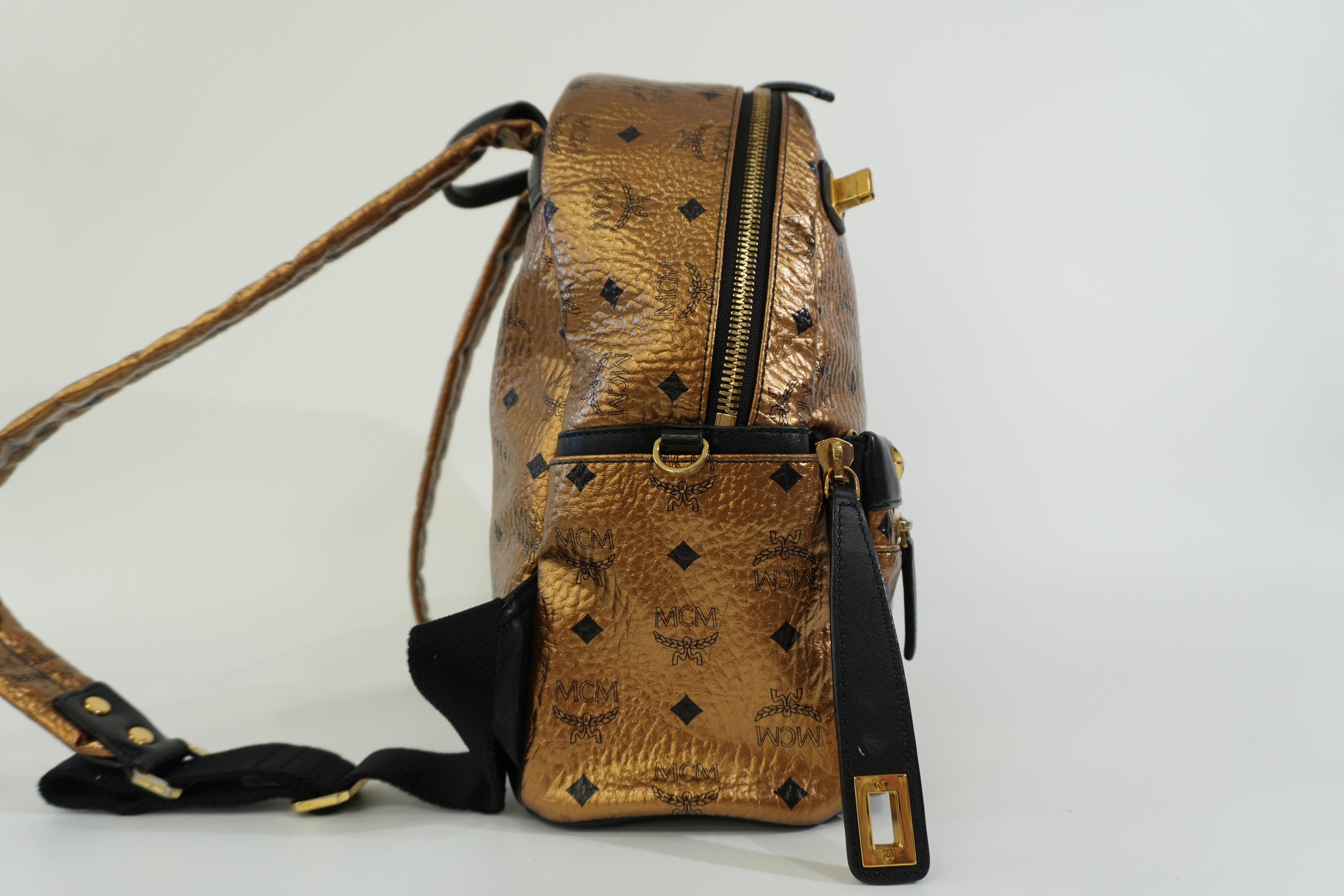 Pre-owned MCM Metallic Backpack with Detachable Pouch Gold