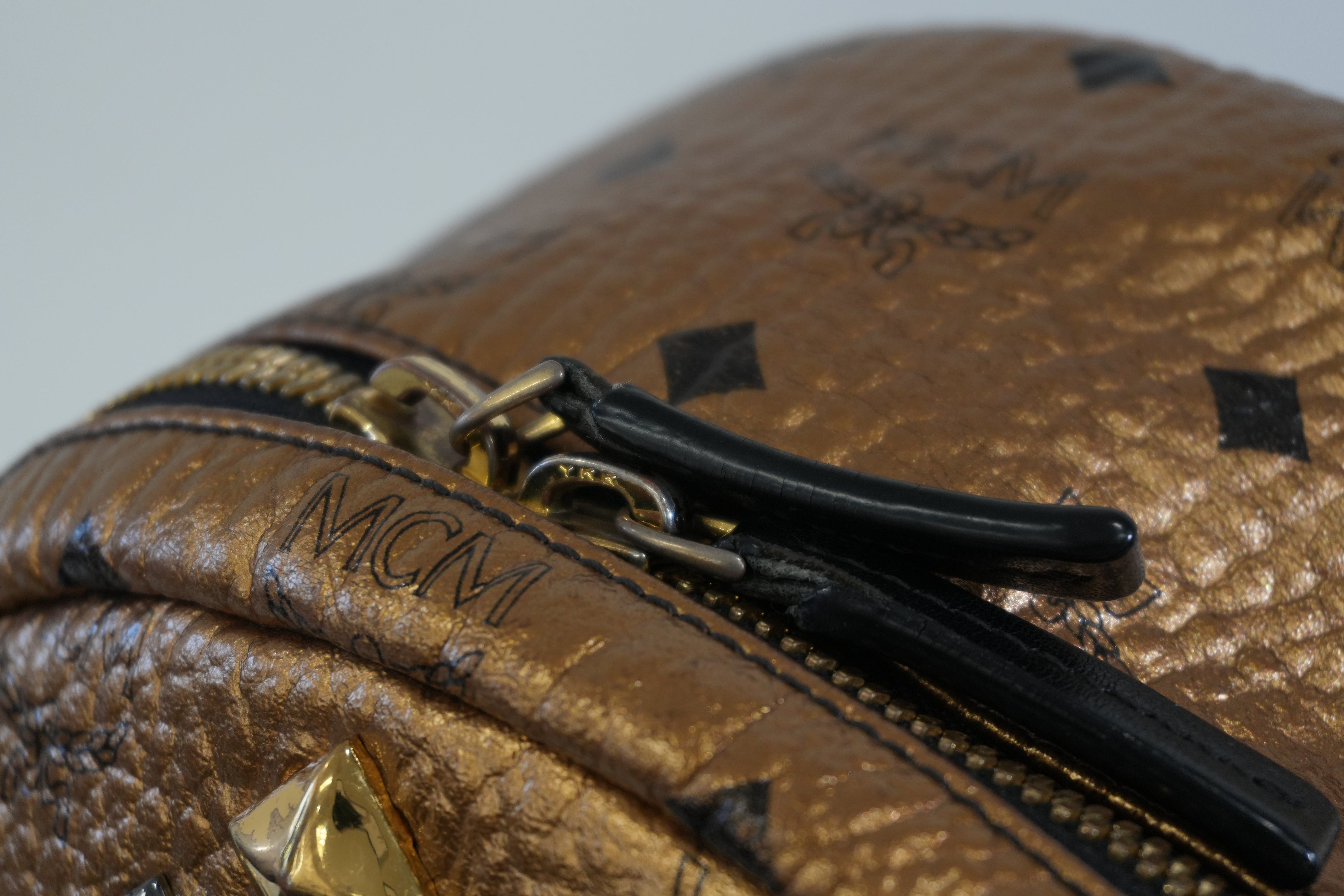 Pre-owned MCM Metallic Backpack with Detachable Pouch Gold