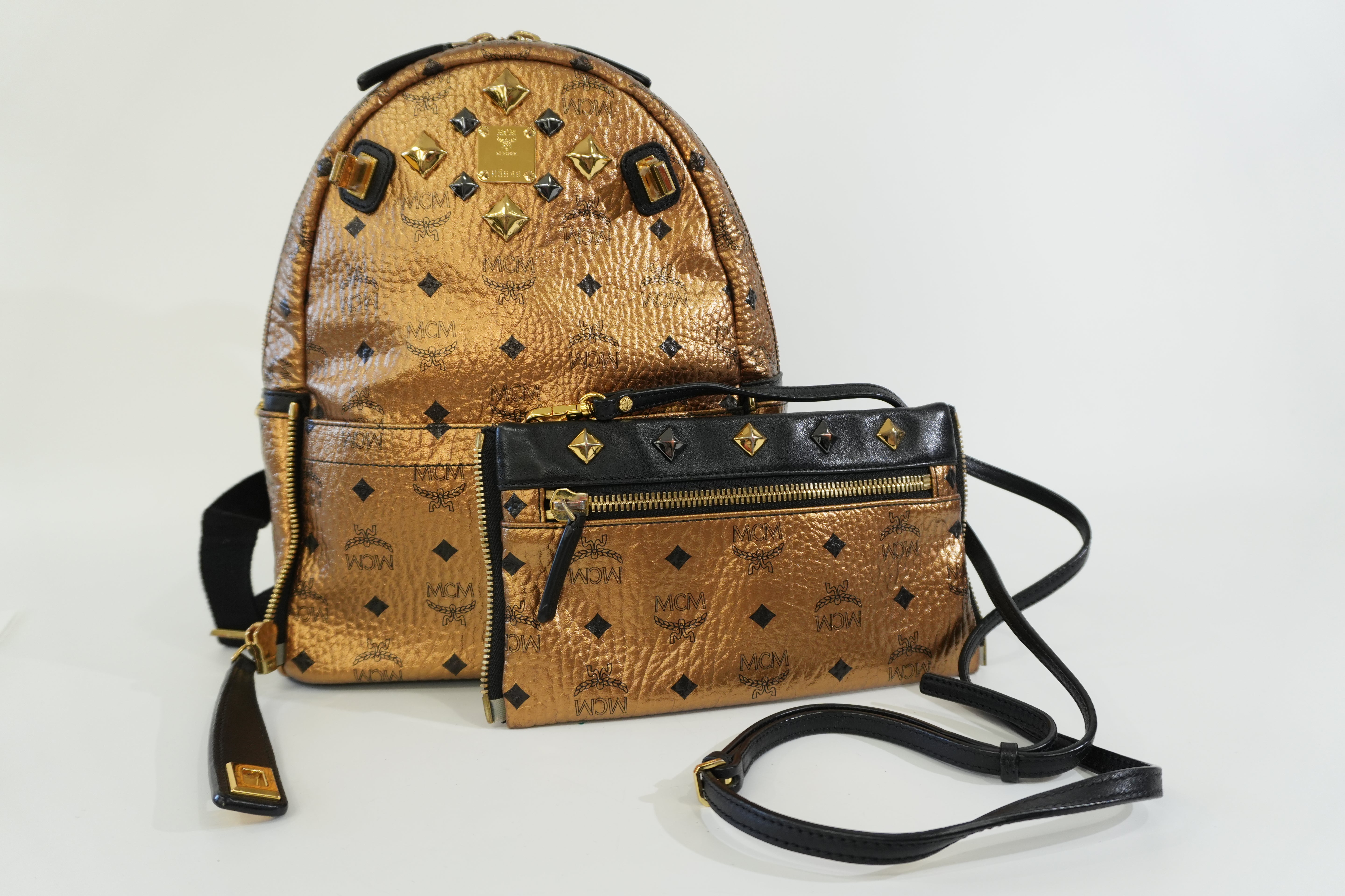 Pre-owned MCM Metallic Backpack with Detachable Pouch Gold