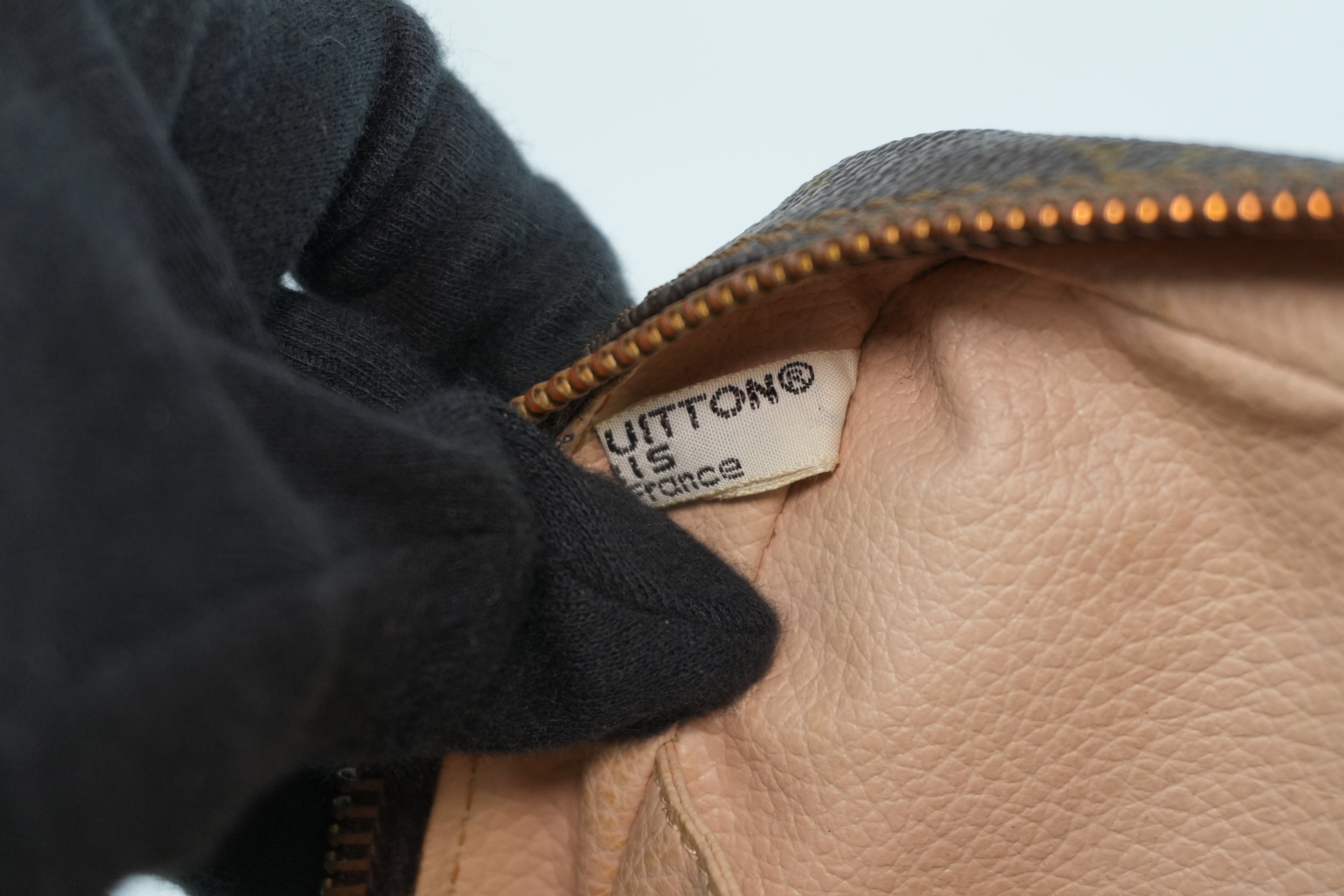 Pre-owned Louis Vuitton Monogram Trousse 23