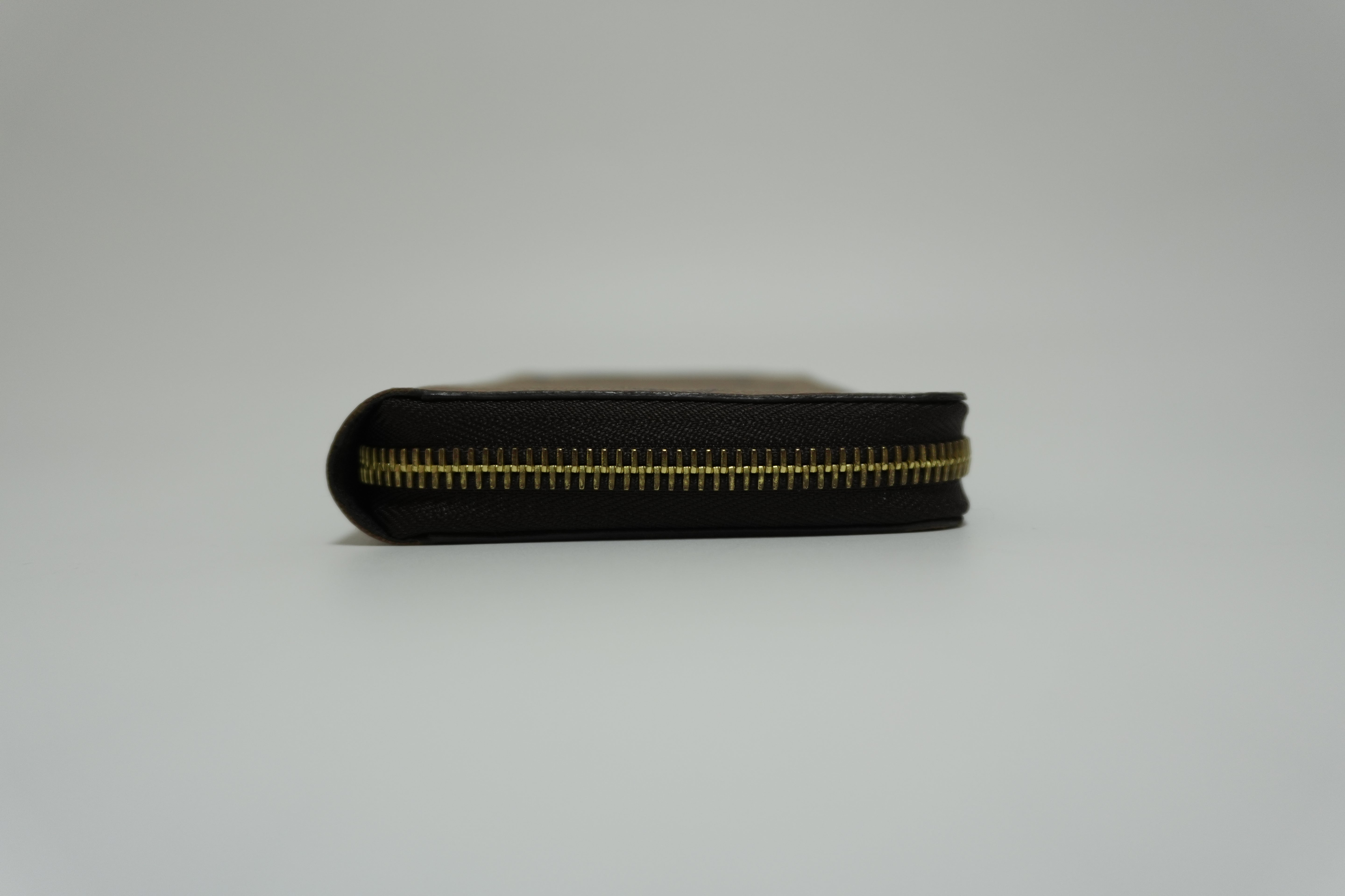 Louis Vuitton Reverse Monogram Wallet Used