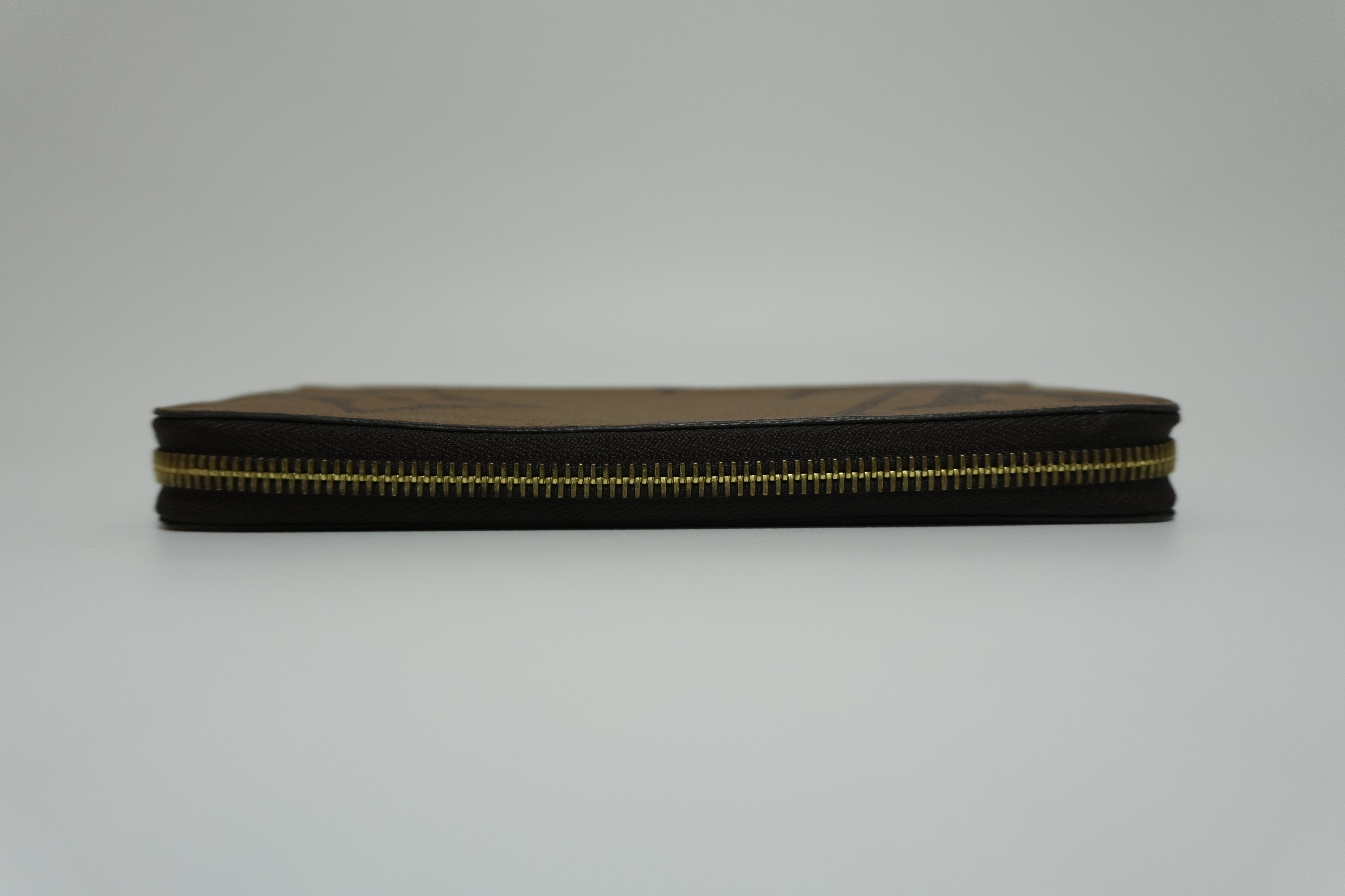 Louis Vuitton Reverse Monogram Wallet Used