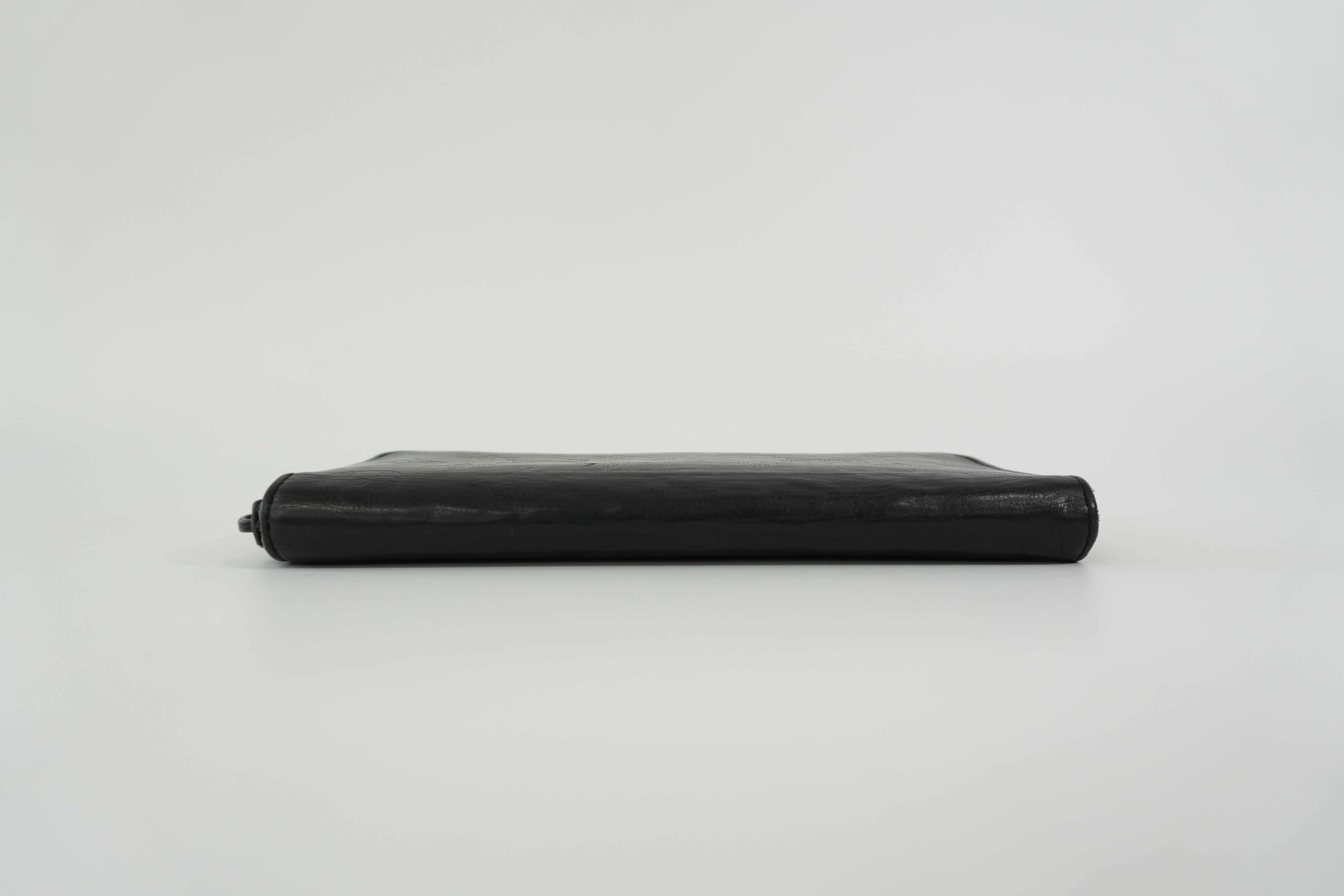 Pre-owned Louis Vuitton Shadow Monogram Vertical Zippy Wallet Black