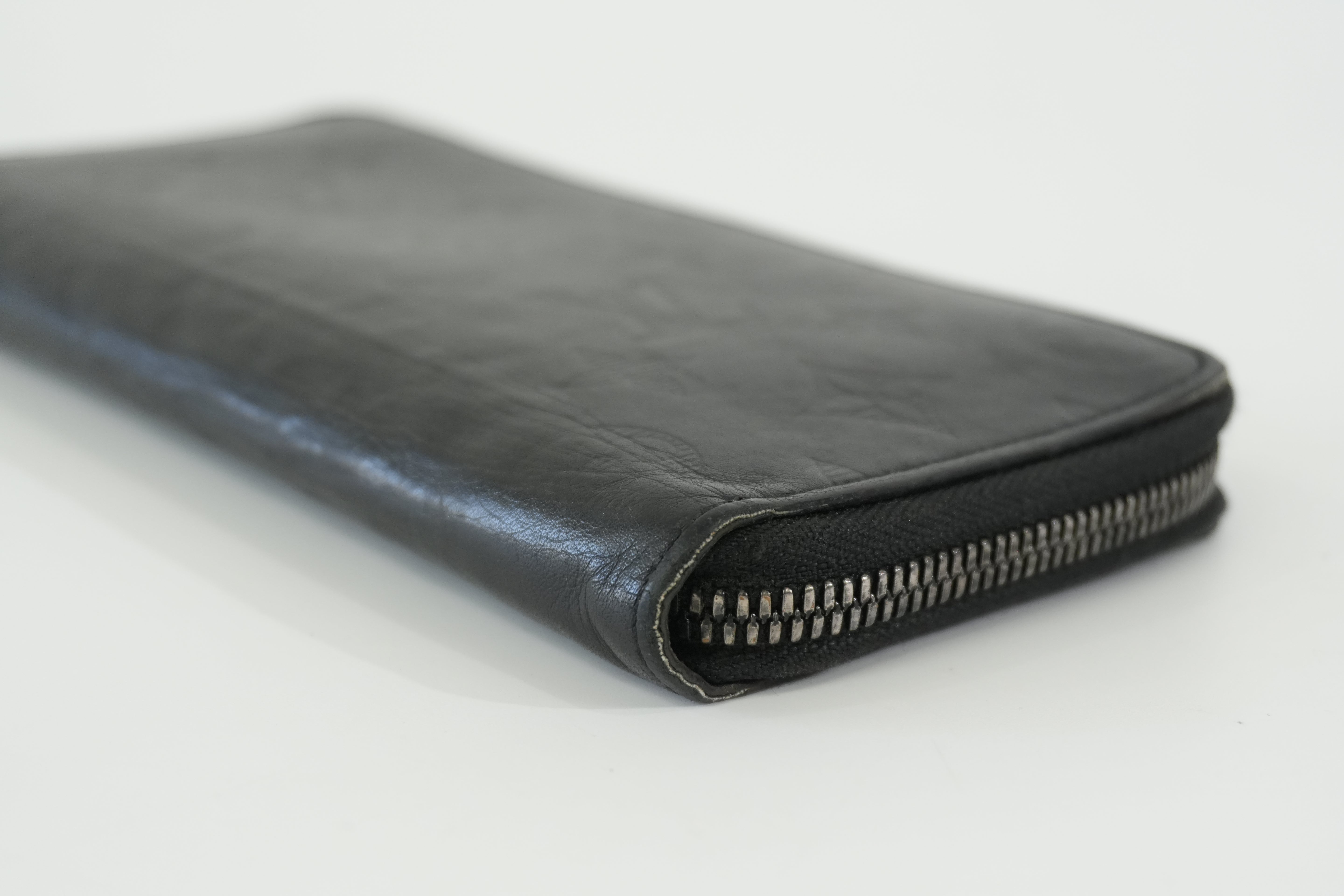 Pre-owned Louis Vuitton Shadow Monogram Vertical Zippy Wallet Black