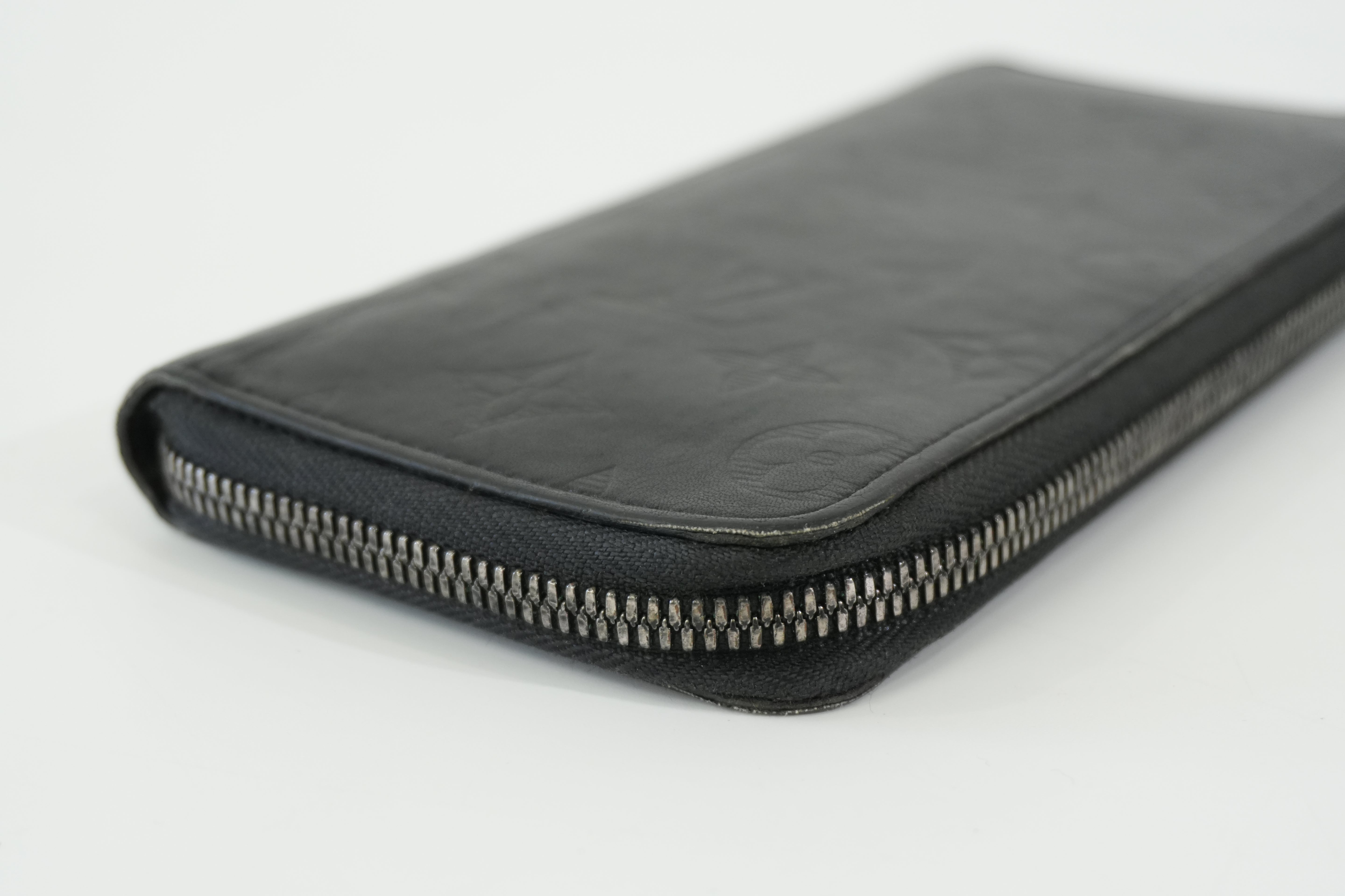 Pre-owned Louis Vuitton Shadow Monogram Vertical Zippy Wallet Black