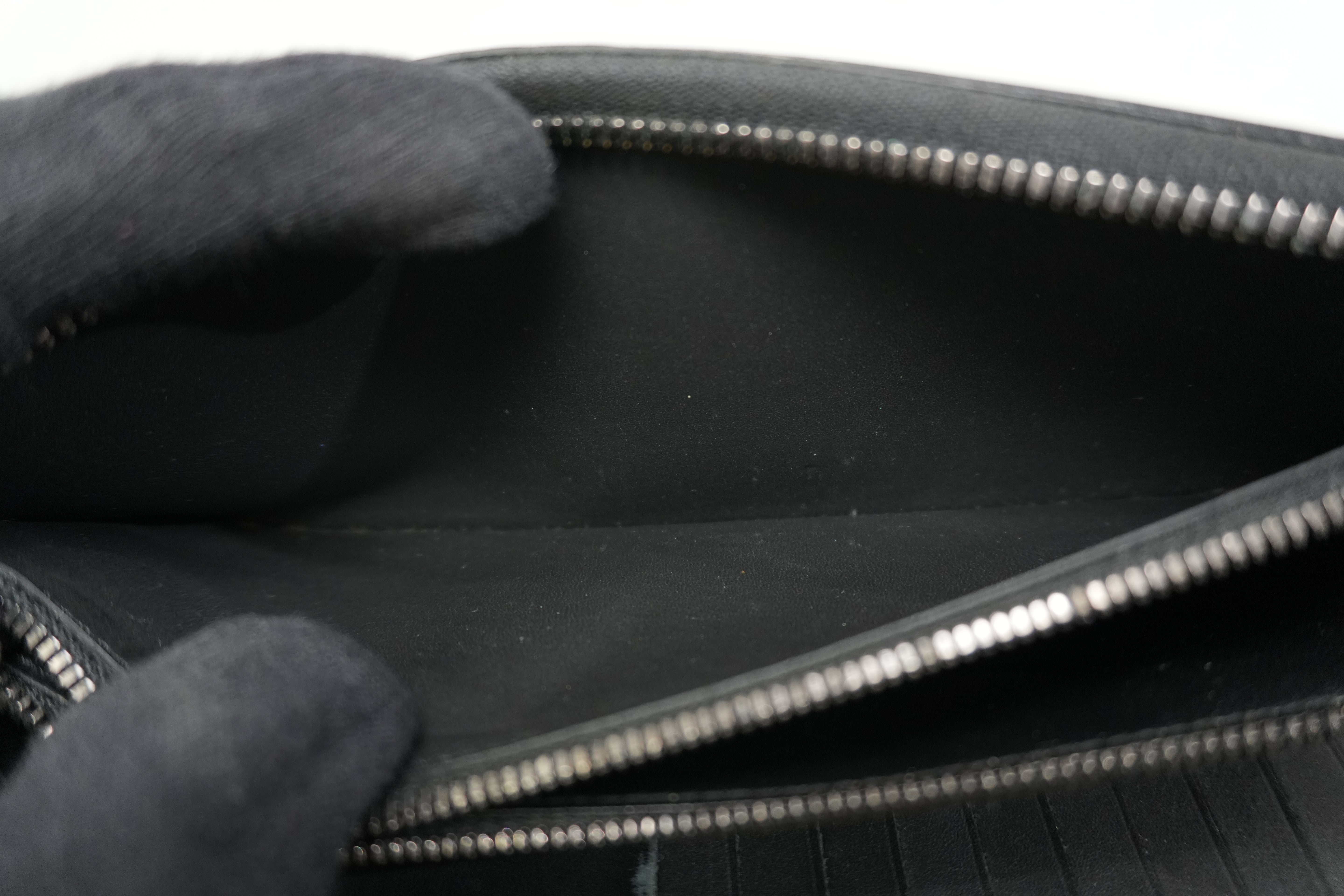 Pre-owned Louis Vuitton Shadow Monogram Vertical Zippy Wallet Black