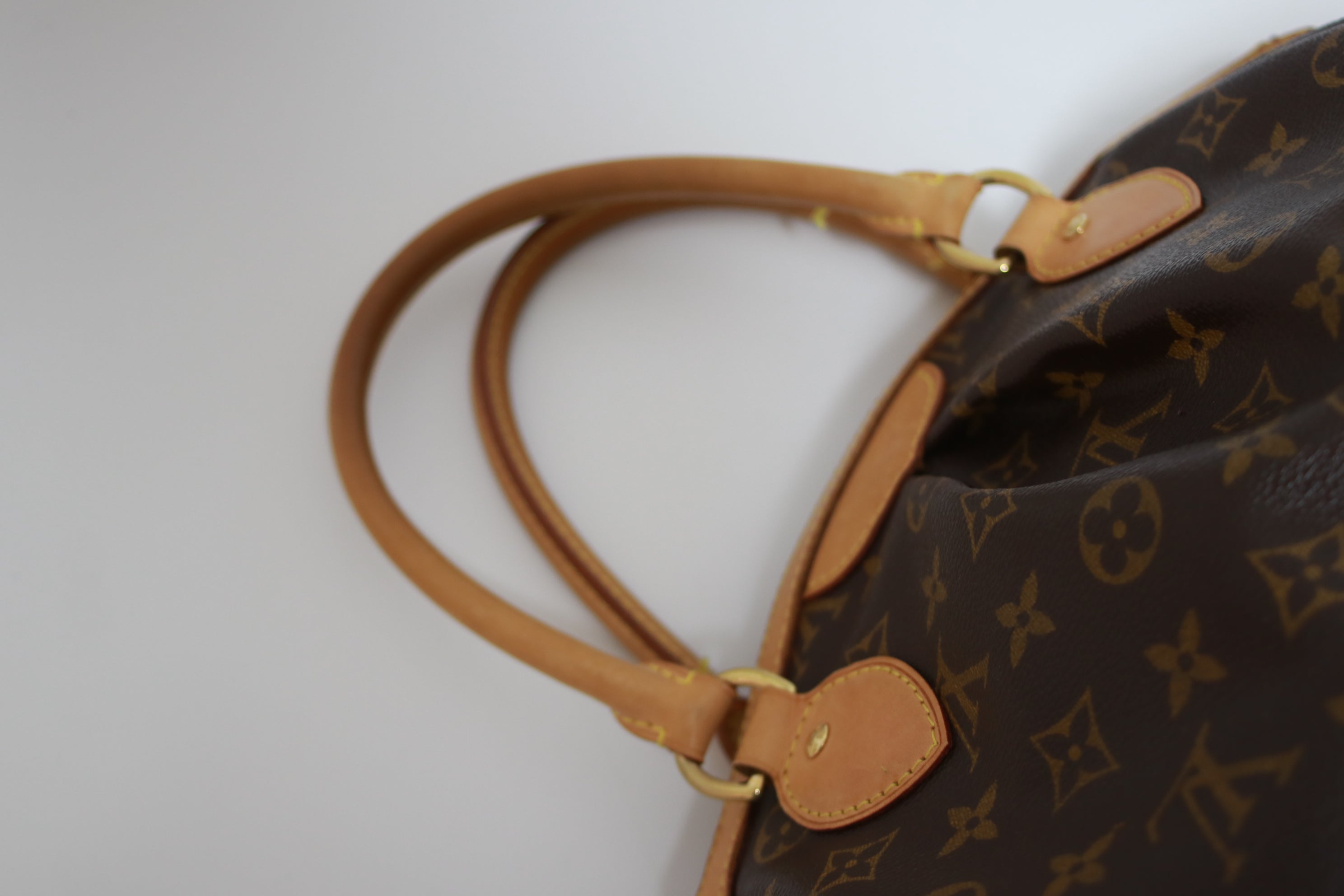 Louis Vuitton Tivoli PM Handbag Used