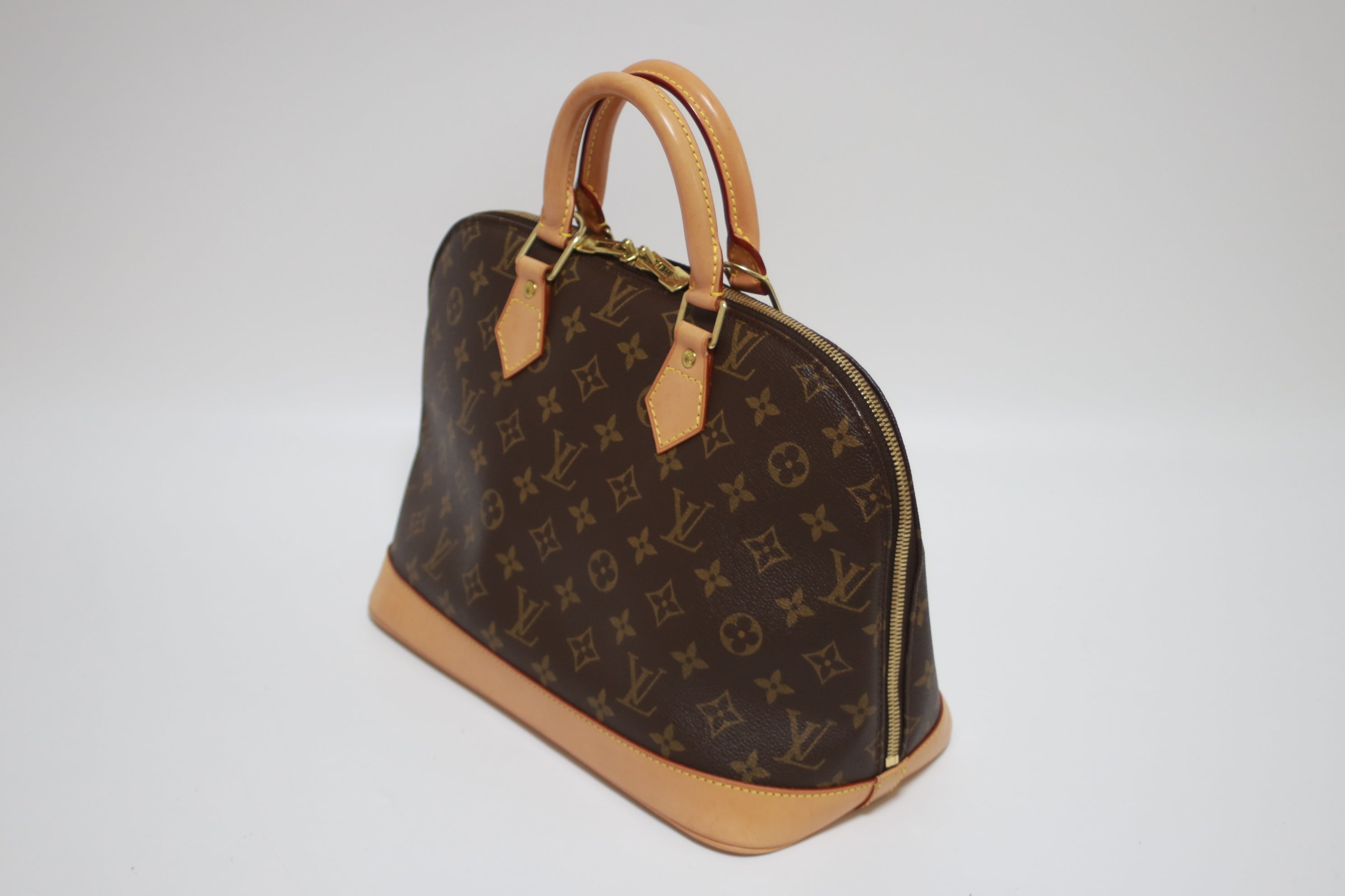Louis Vuitton Alma PM Handbag Used