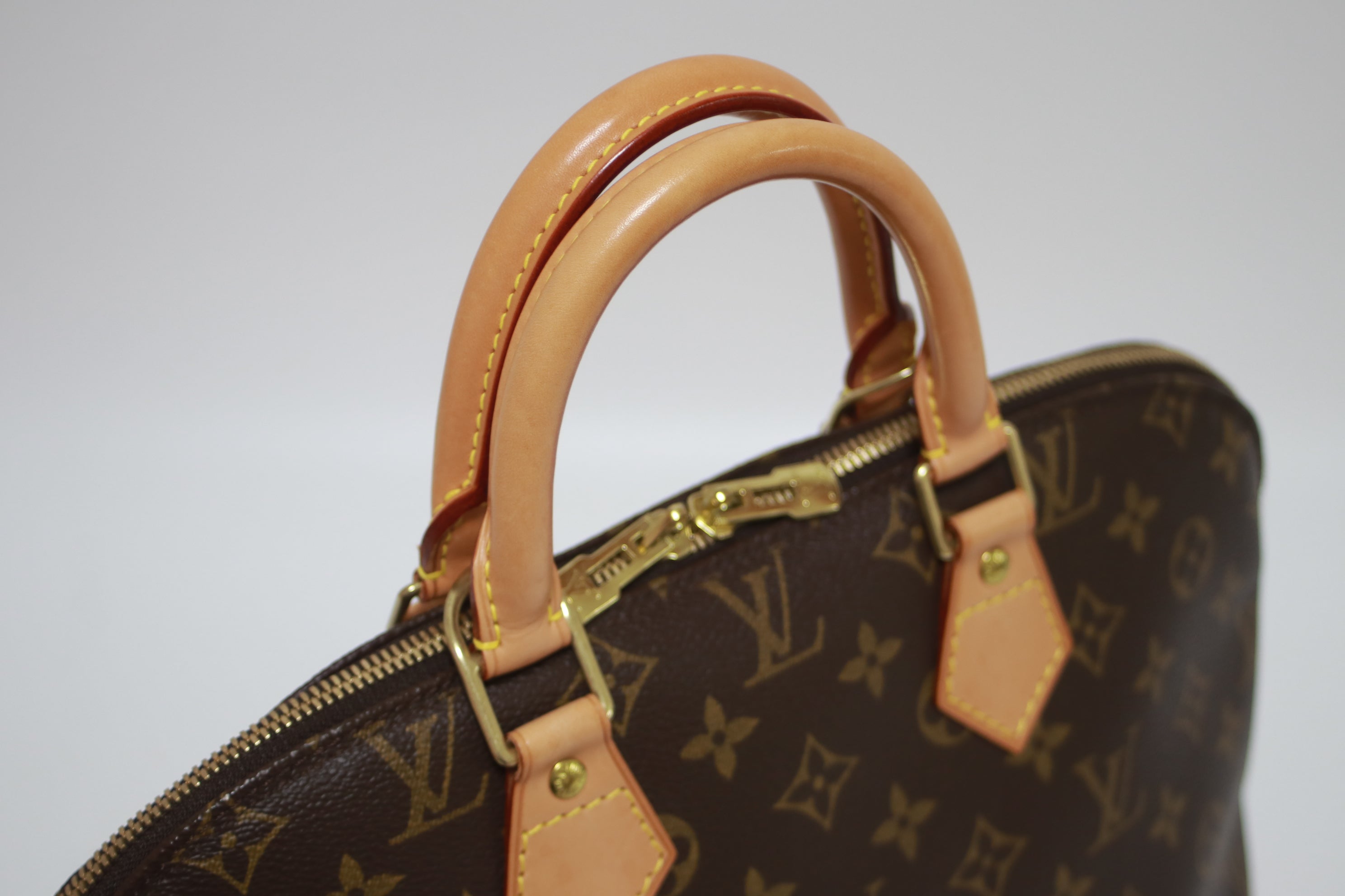 Louis Vuitton Alma PM Handbag Used