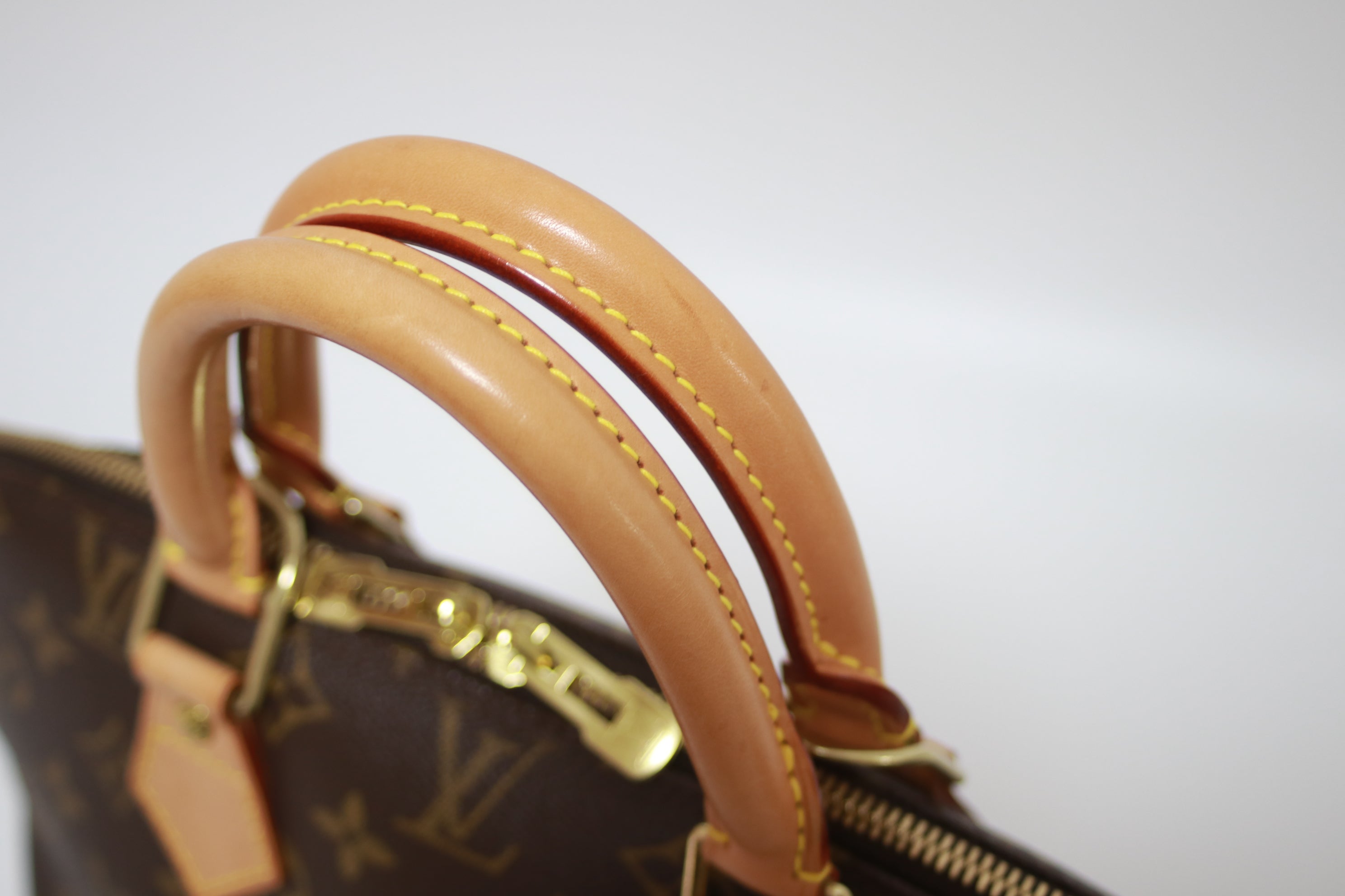 Louis Vuitton Alma PM Handbag Used
