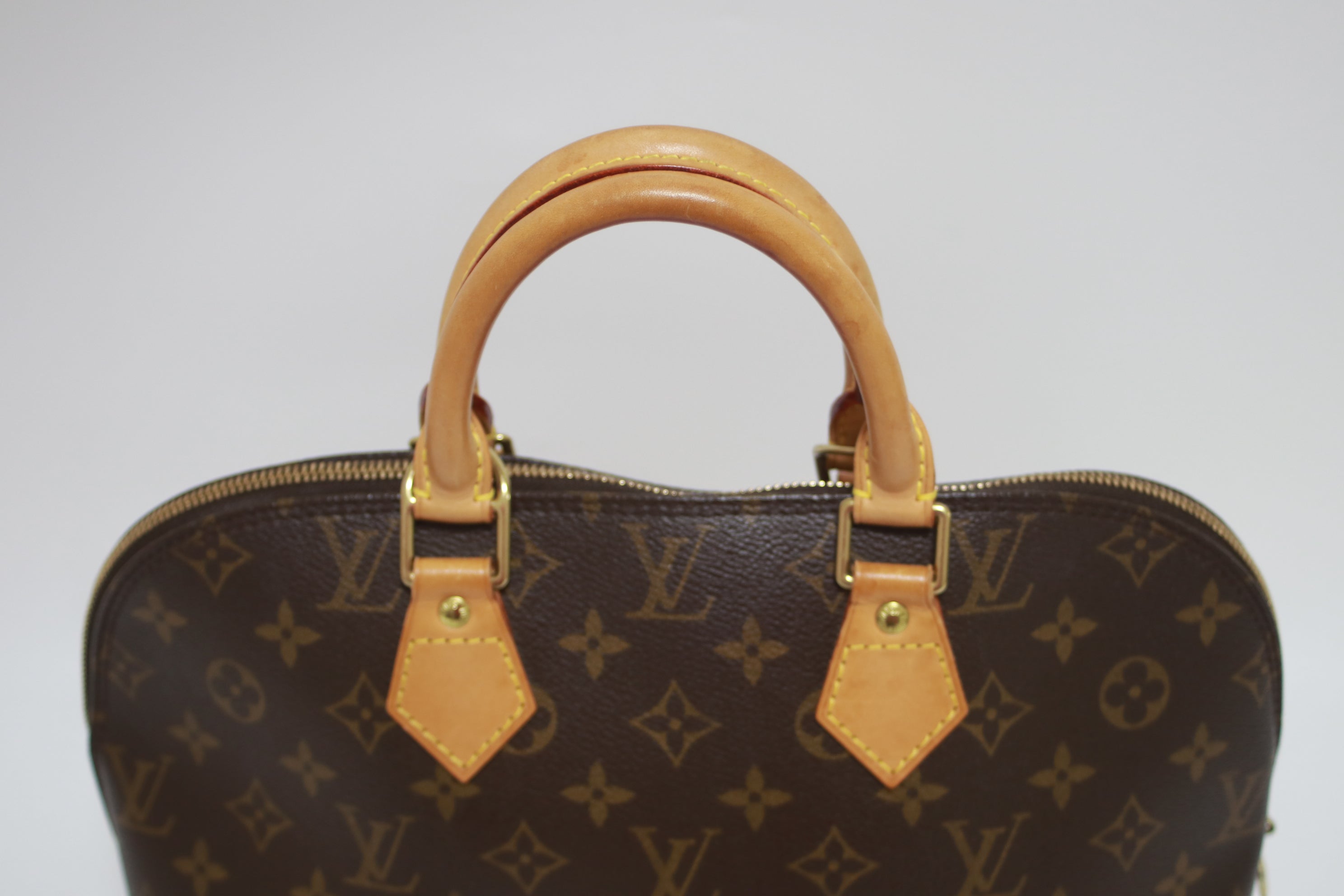 Louis Vuitton Alma PM Handbag Used