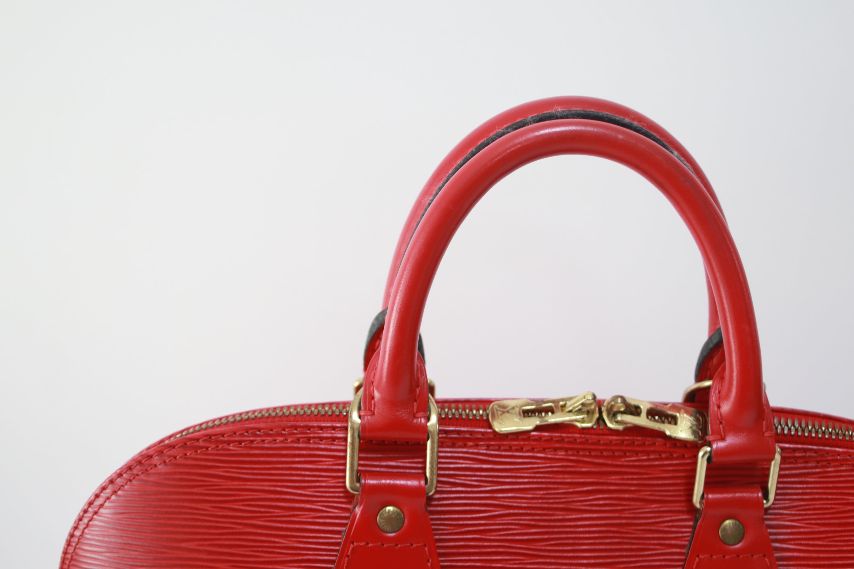Louis Vuitton Alma PM Epi Handbag Red Used
