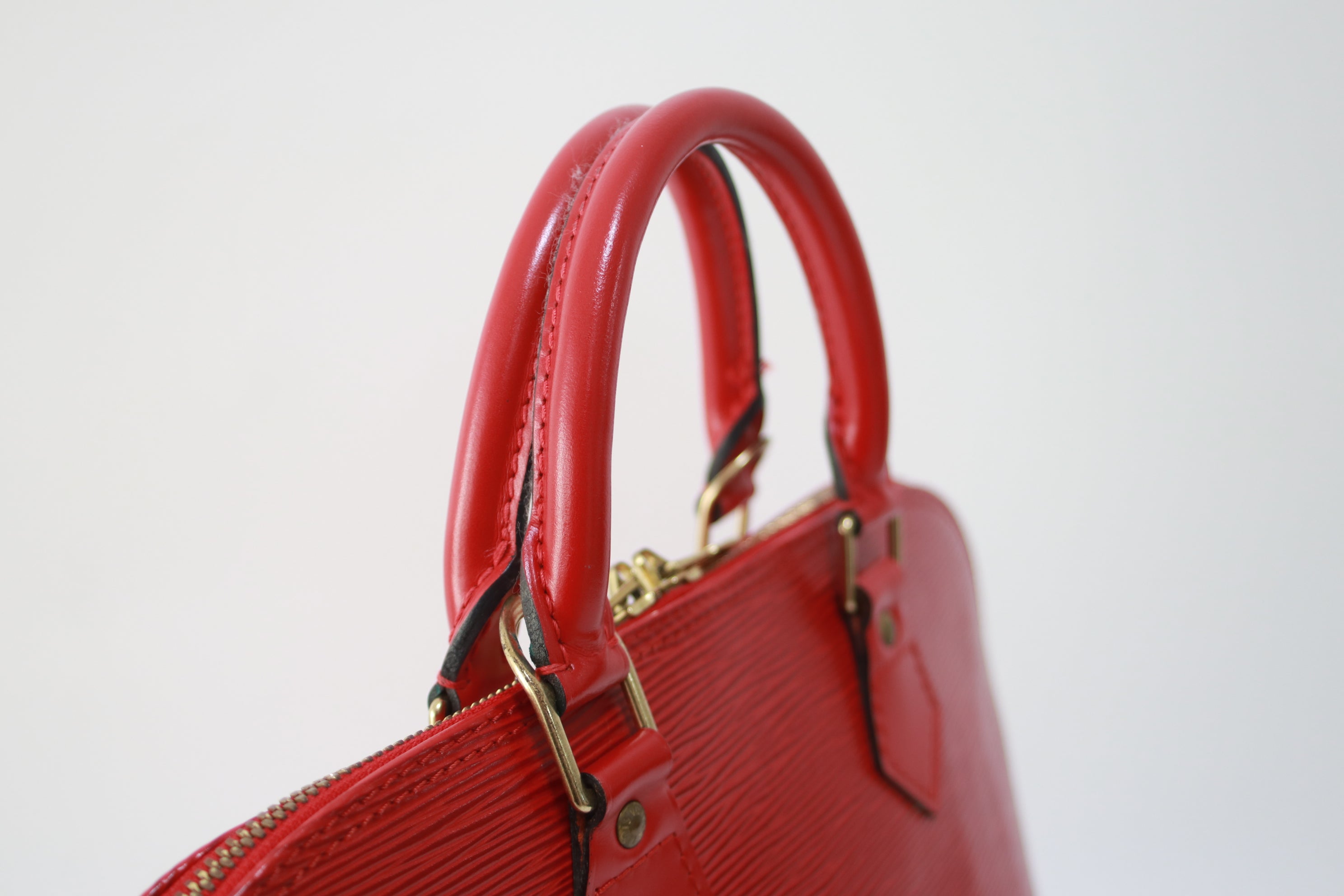 Louis Vuitton Alma PM Epi Handbag Red Used