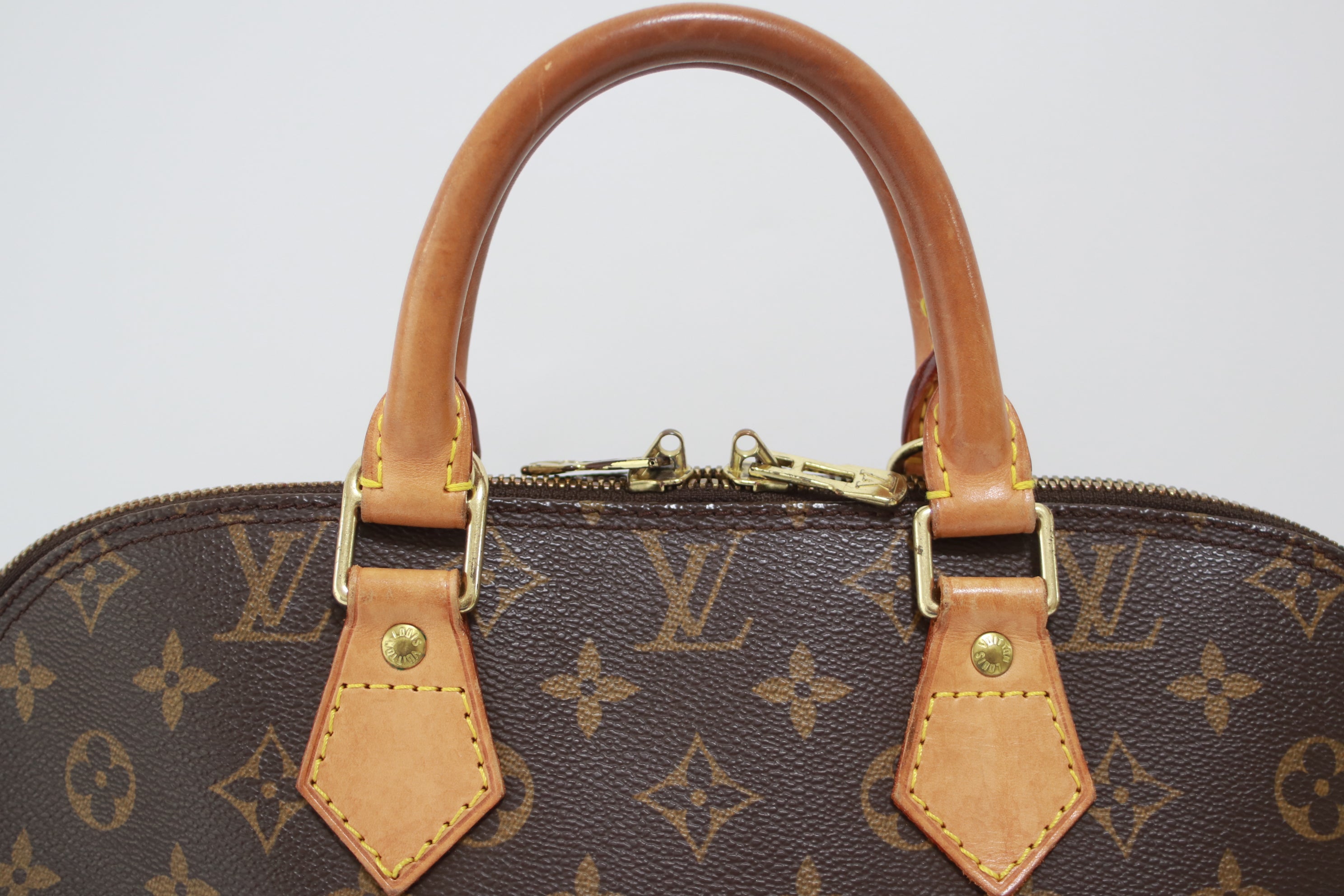 Louis Vuitton Alma PM Handbag Used