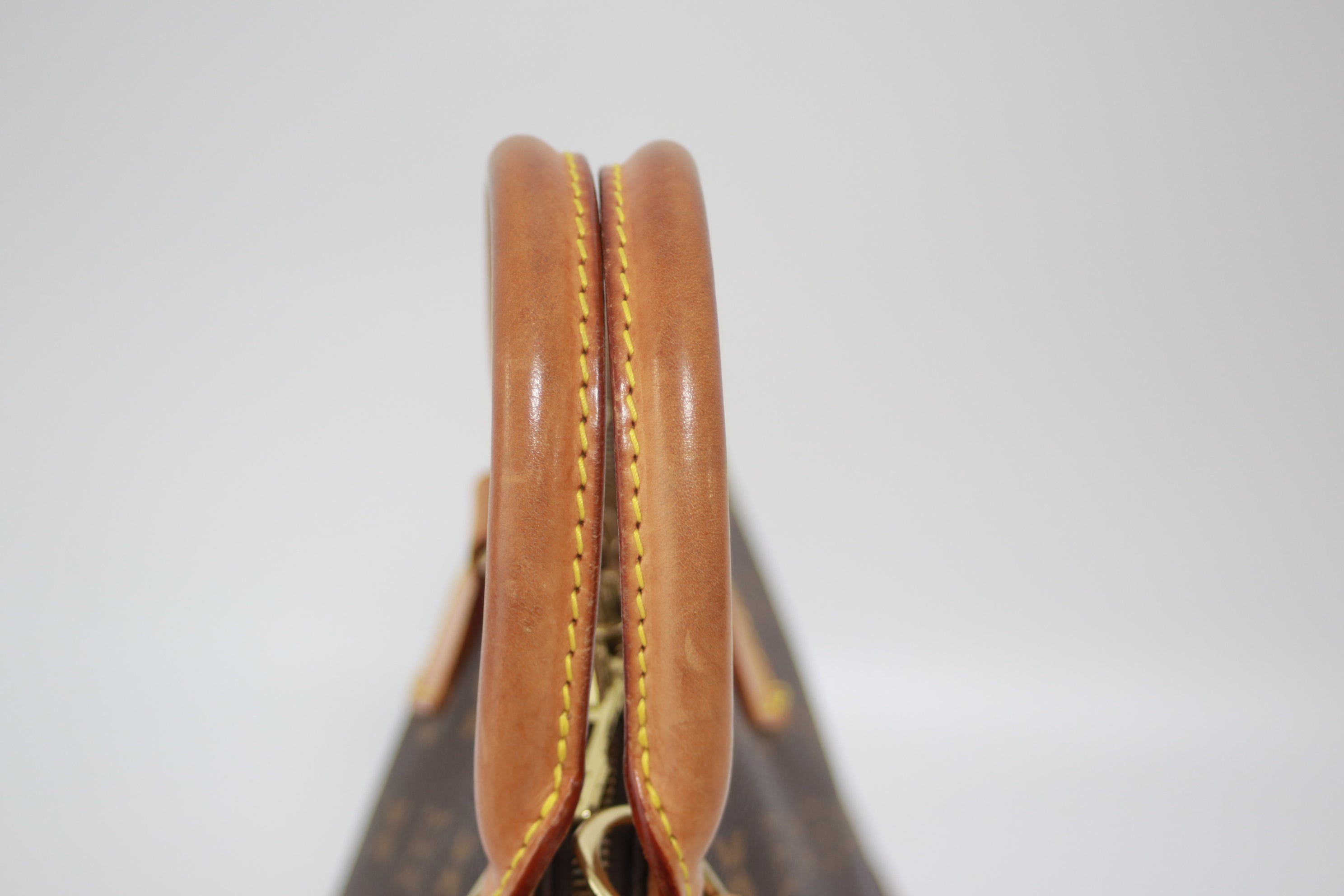 Louis Vuitton Alma PM Handbag Used