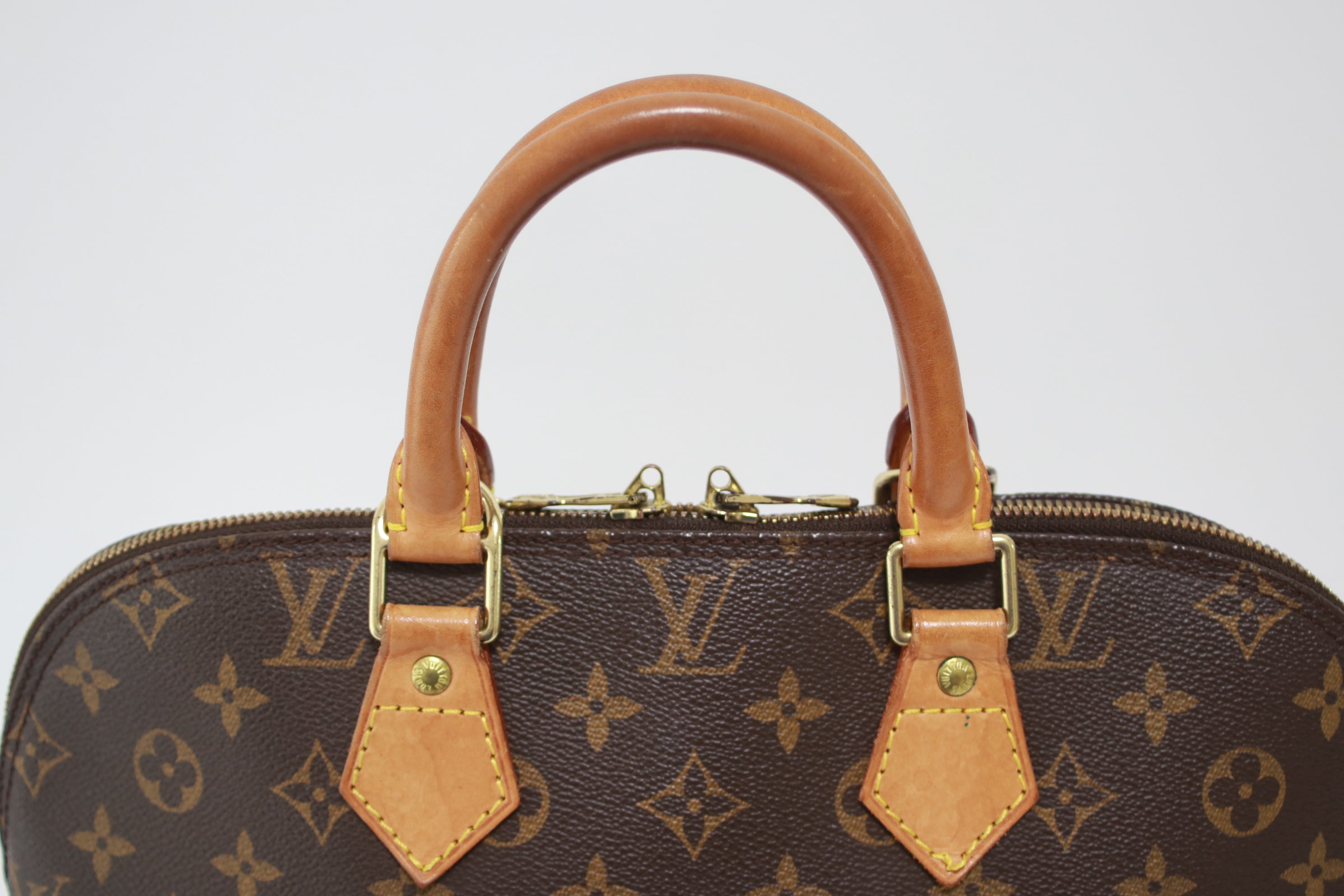 Louis Vuitton Alma PM Handbag Used