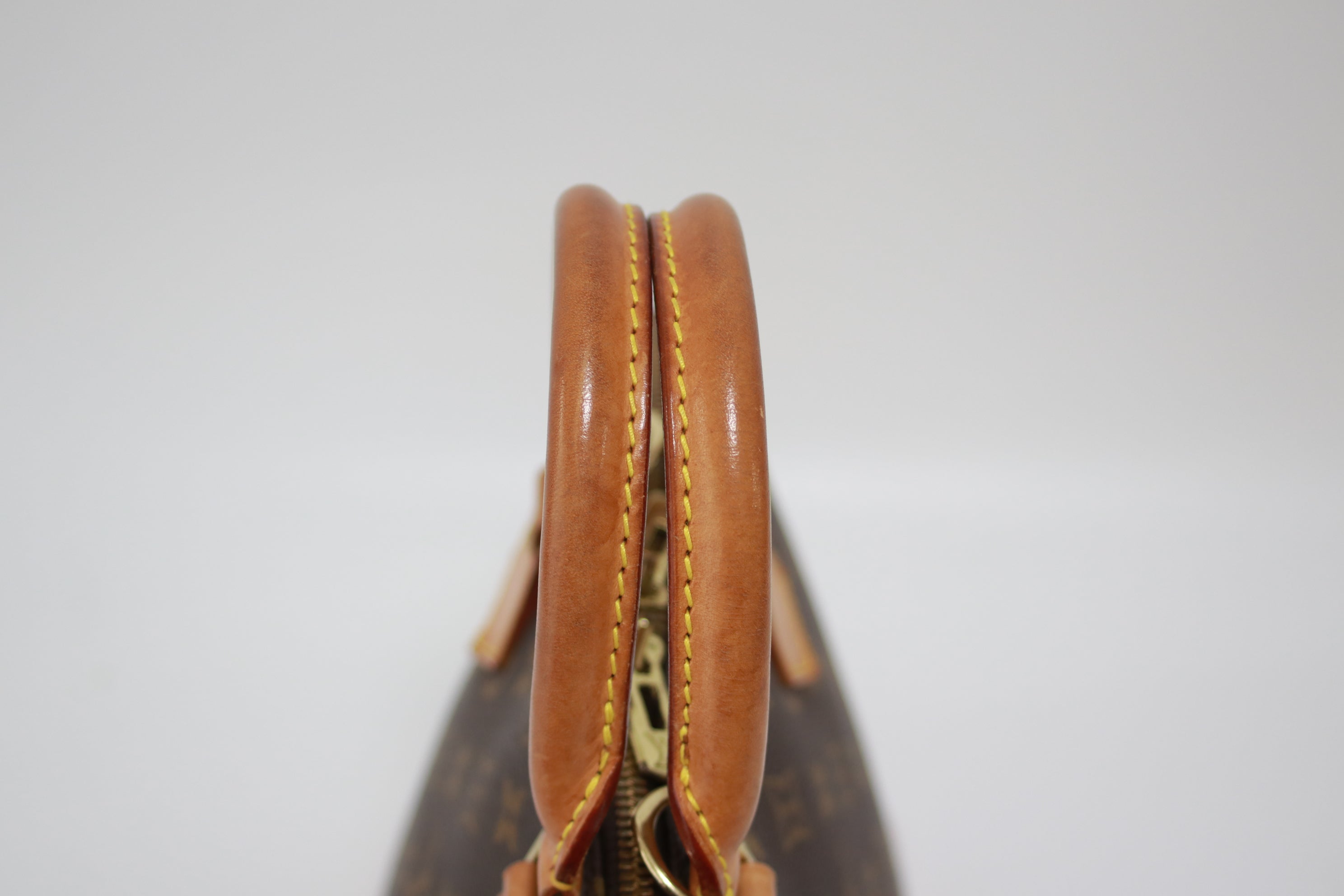 Louis Vuitton Alma PM Handbag Used