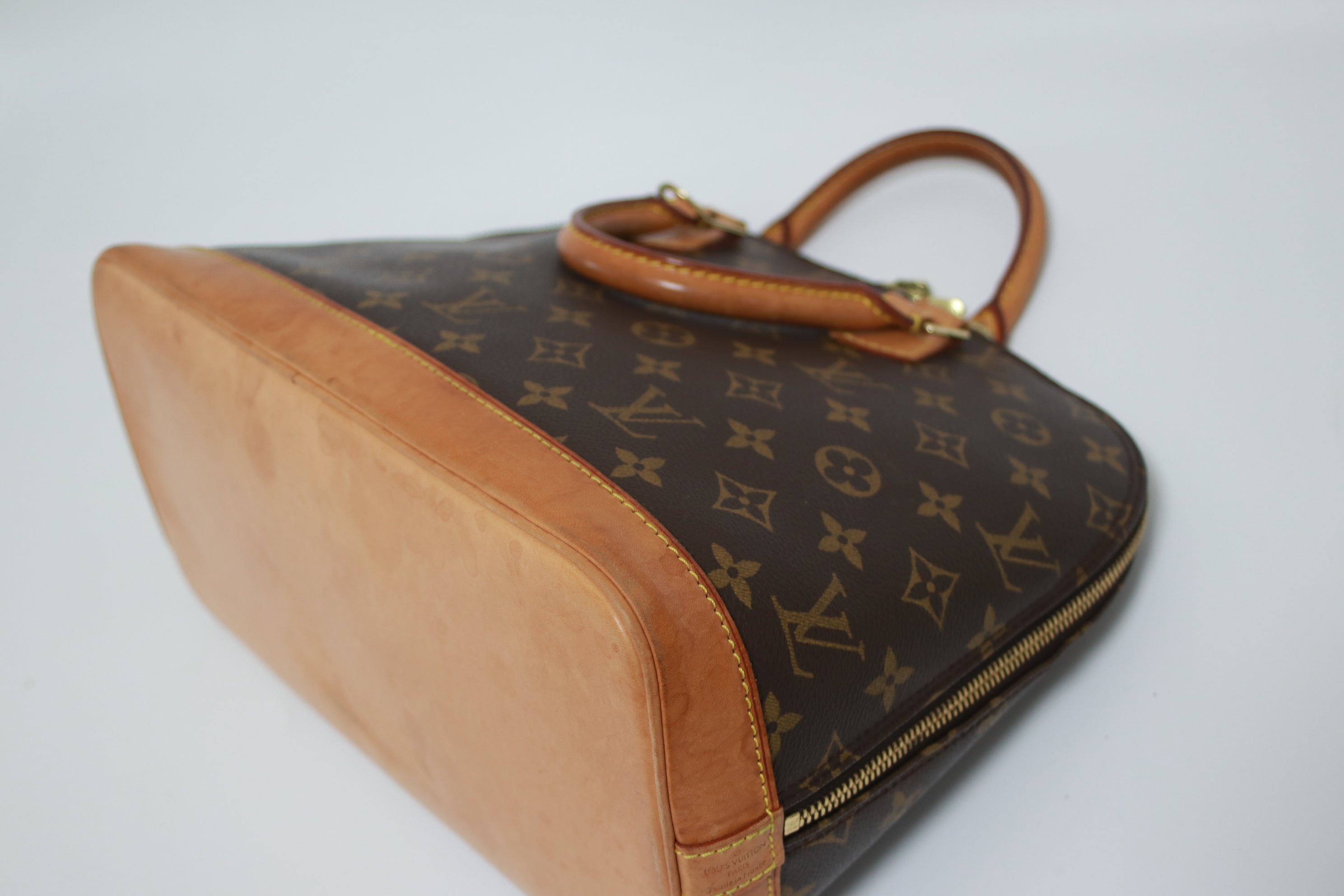 Louis Vuitton Alma PM Handbag Used