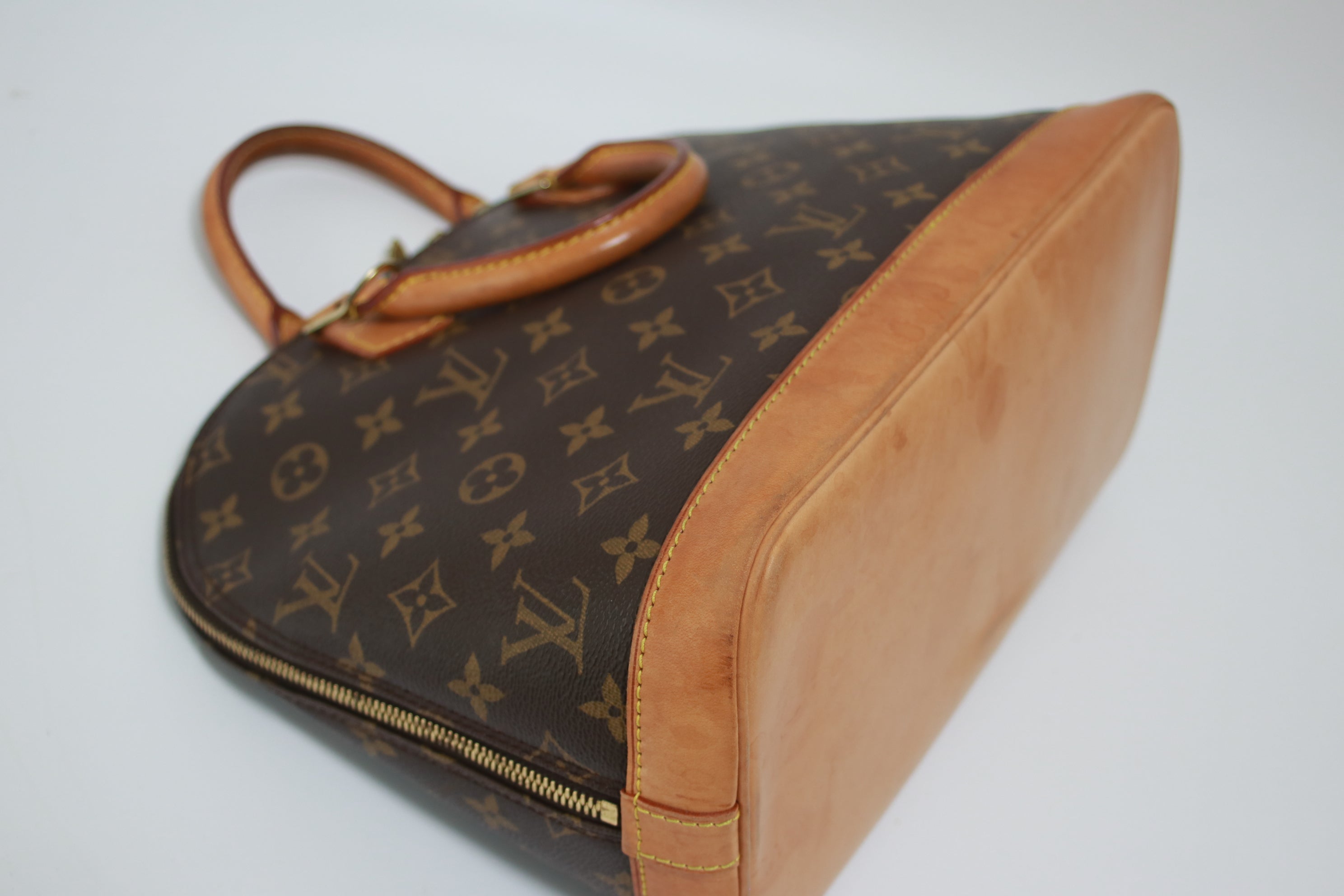 Louis Vuitton Alma PM Handbag Used