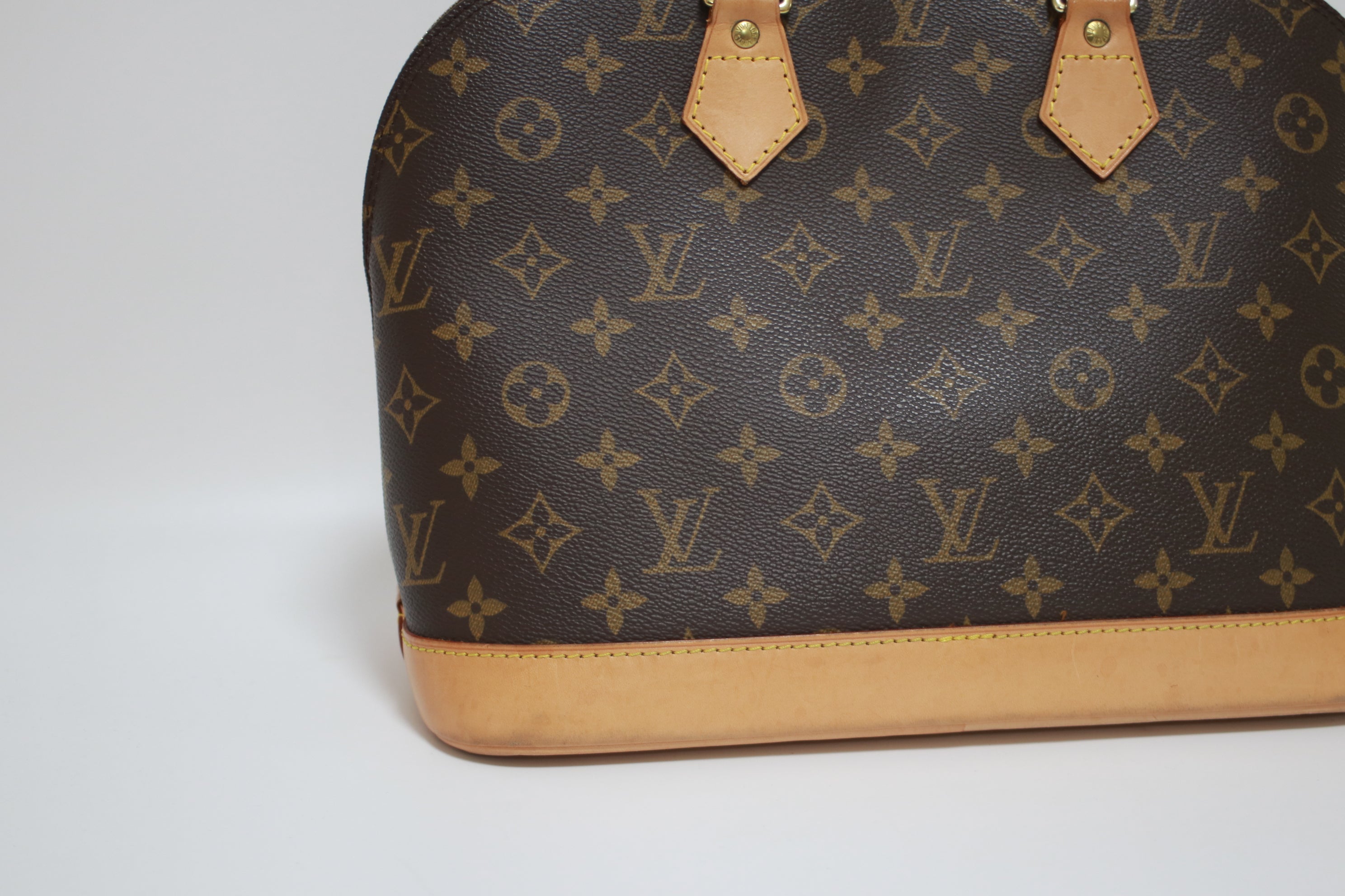 Louis Vuitton Alma PM Handbag Used