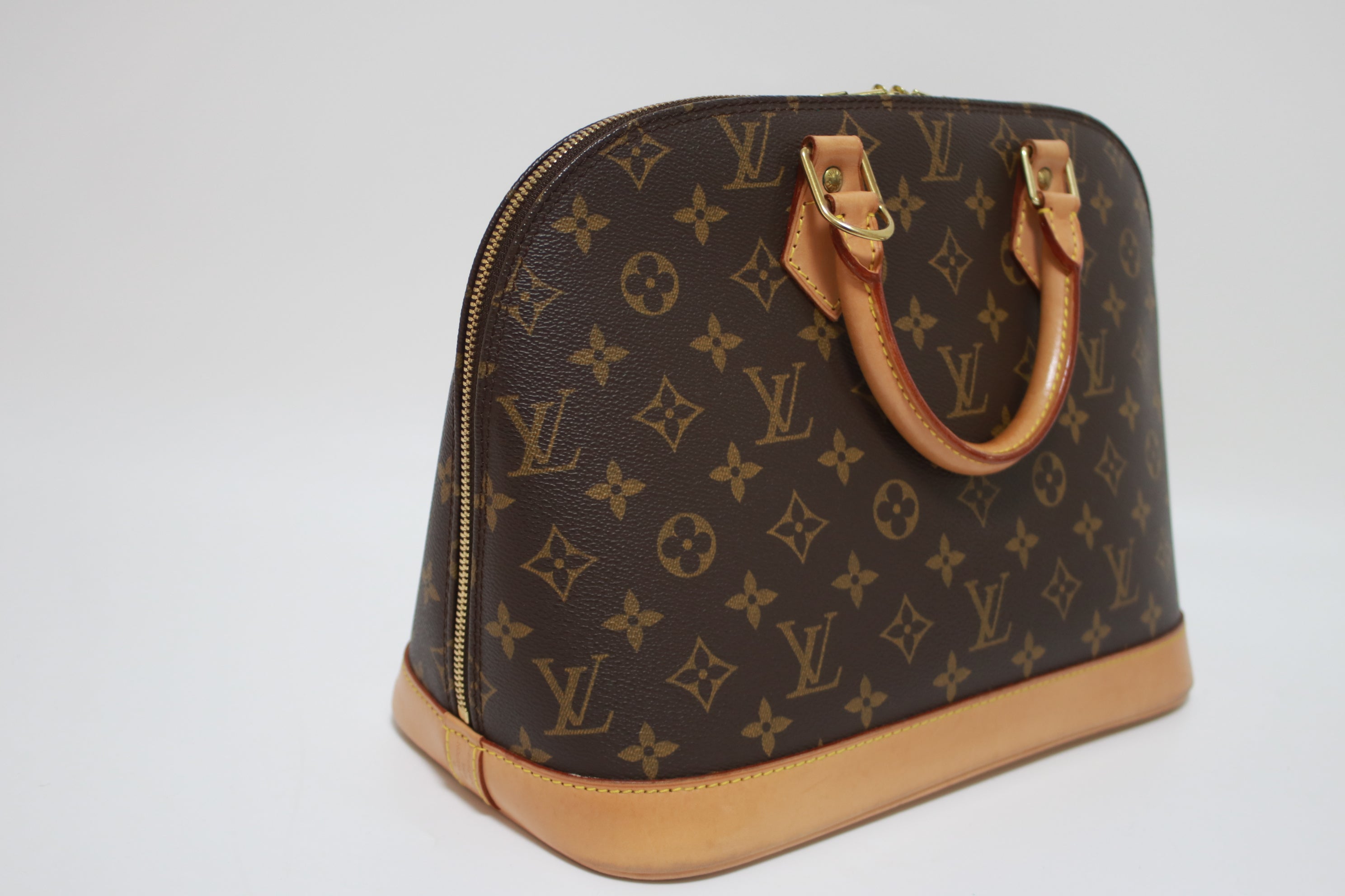 Louis Vuitton Alma PM Handbag Used