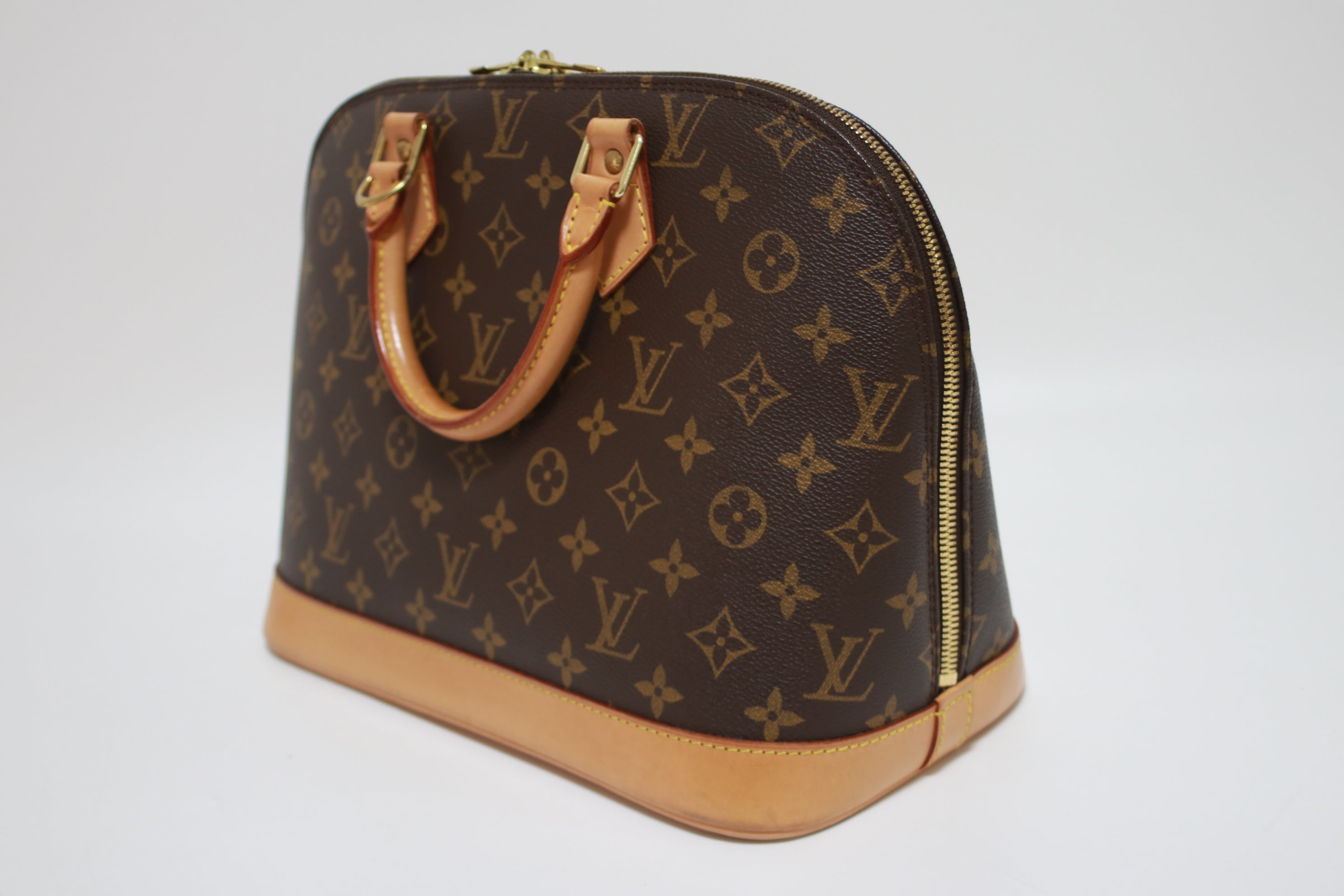 Louis Vuitton Alma PM Handbag Used