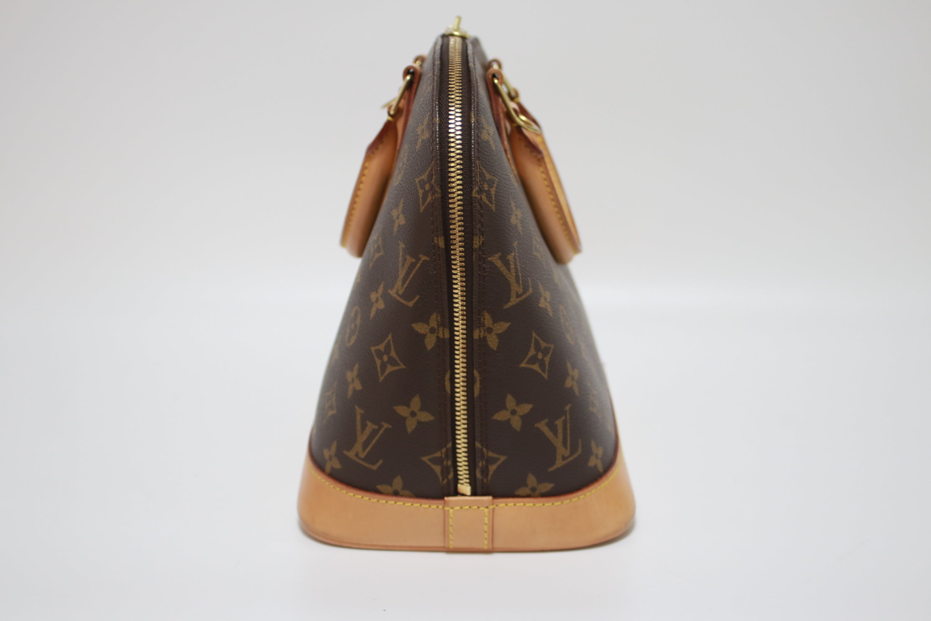 Louis Vuitton Alma PM Handbag Used
