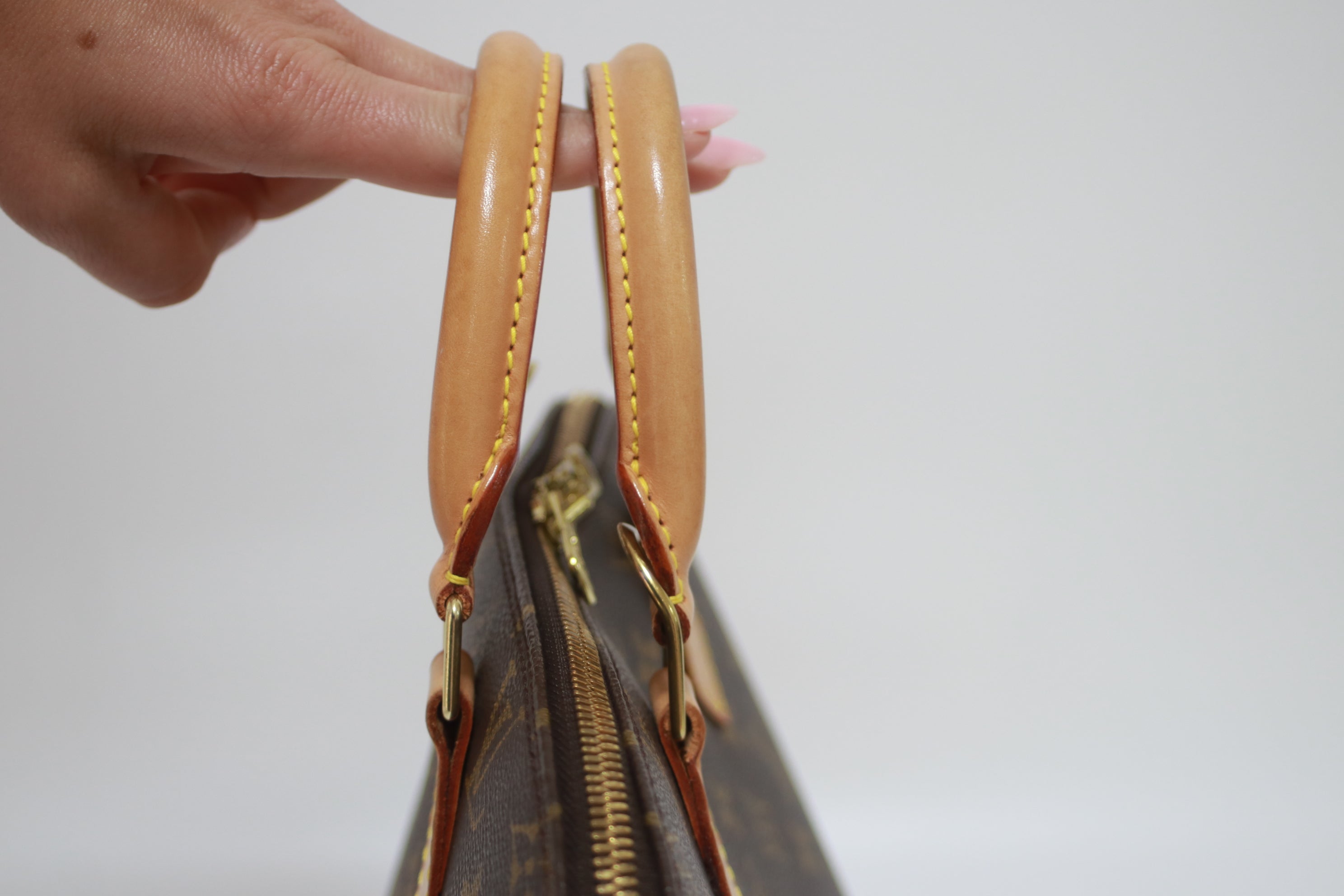 Louis Vuitton Alma PM Handbag Used