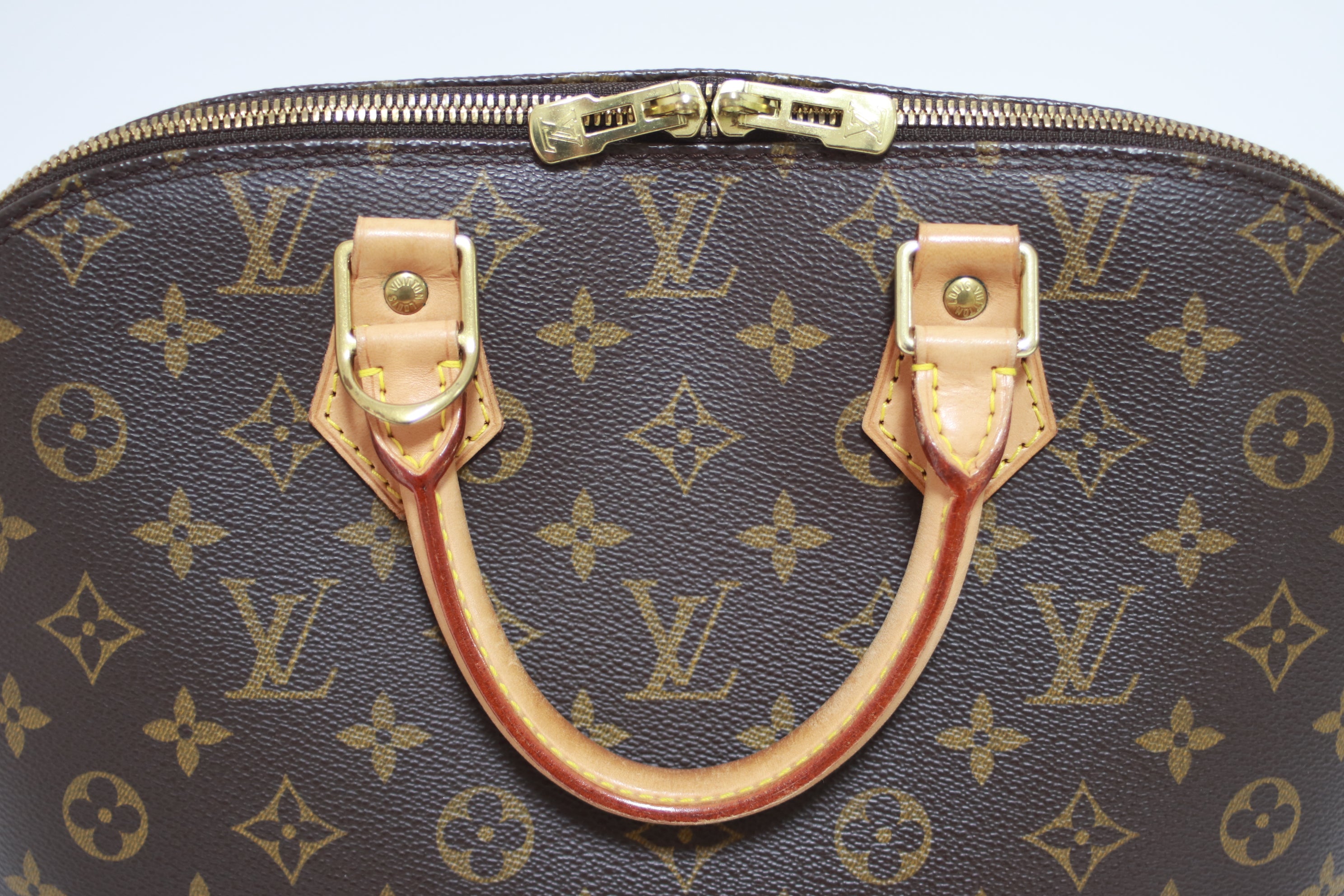 Louis Vuitton Alma PM Handbag Used