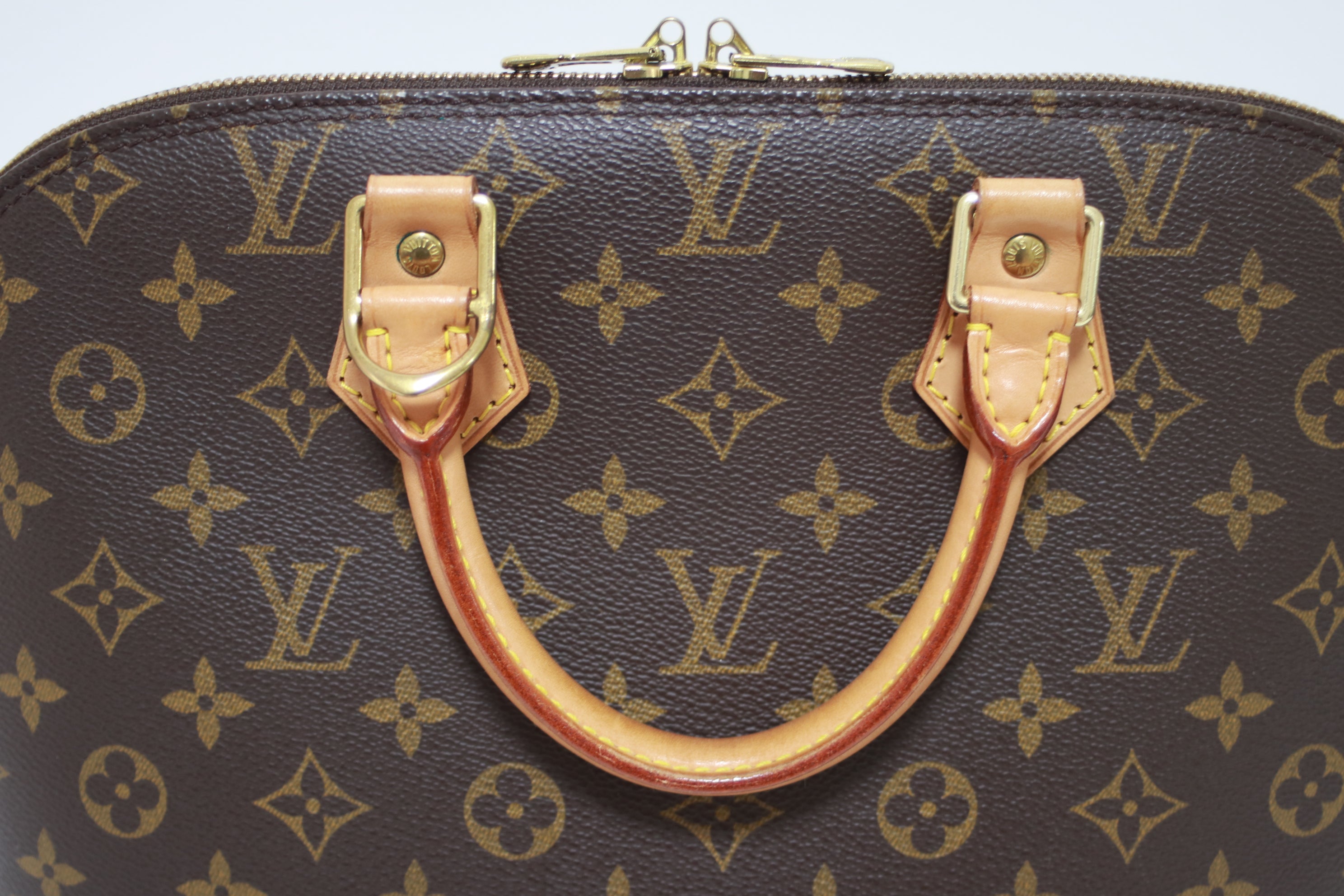 Louis Vuitton Alma PM Handbag Used