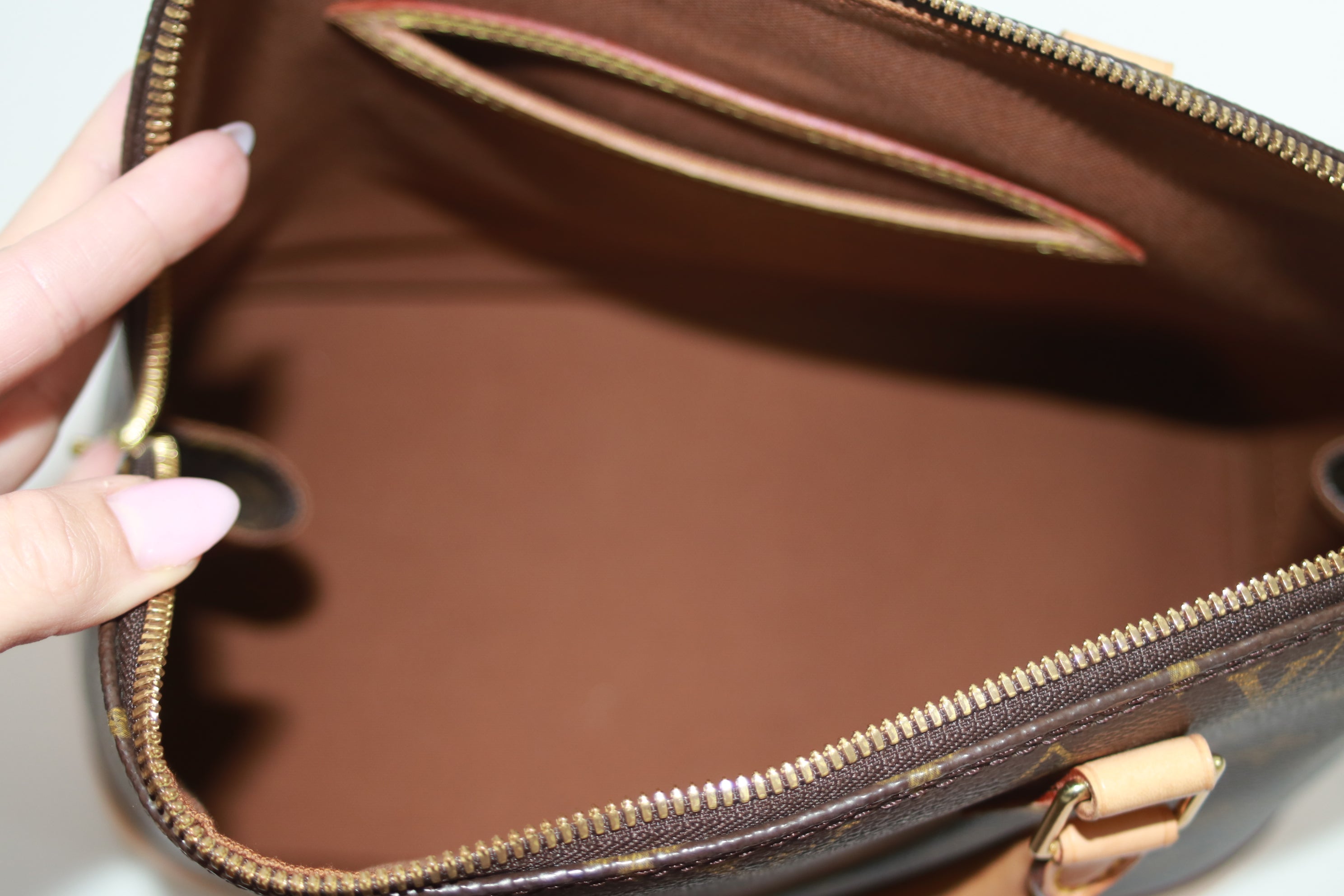 Louis Vuitton Alma PM Handbag Used