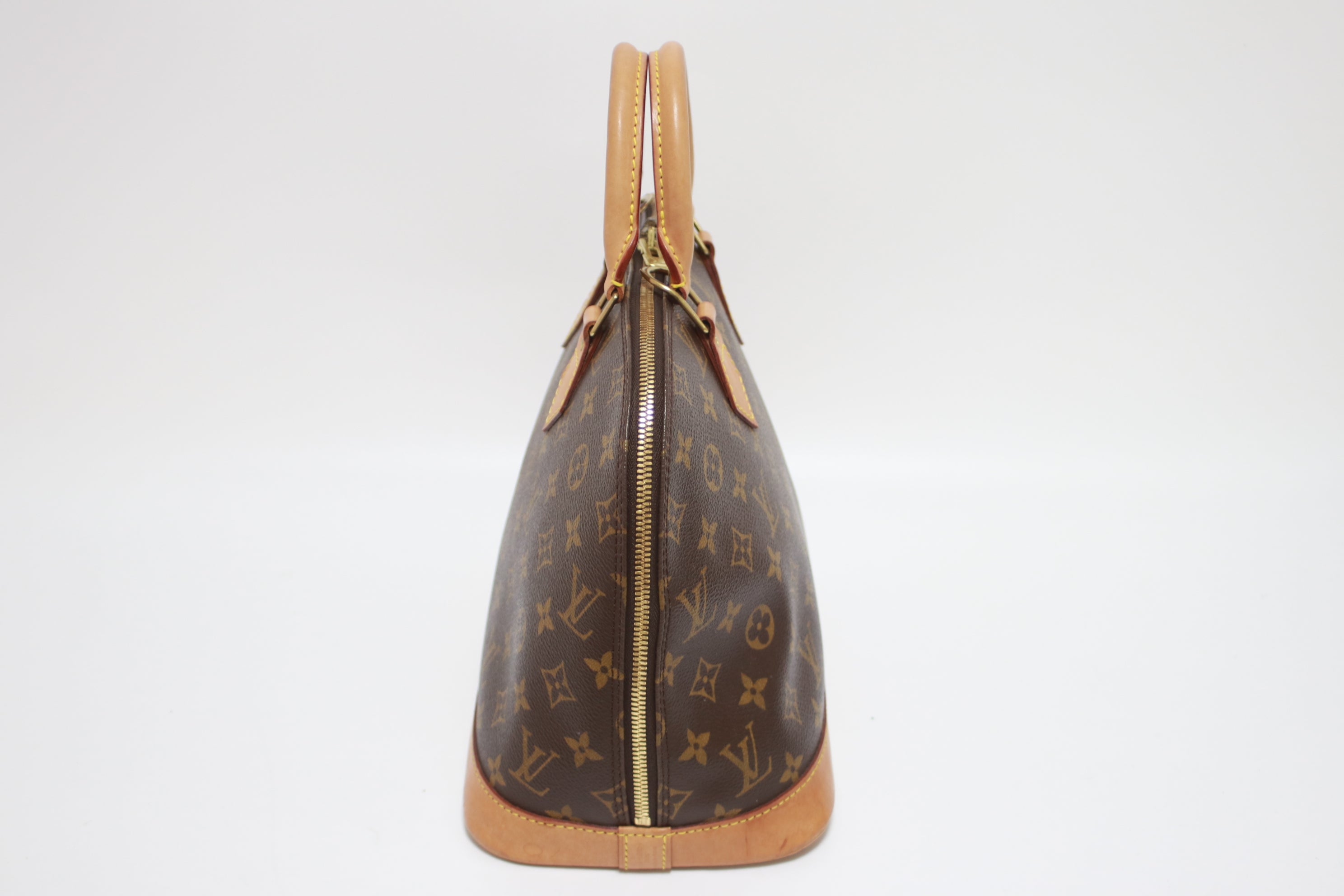 Louis Vuitton Alma PM Handbag Used