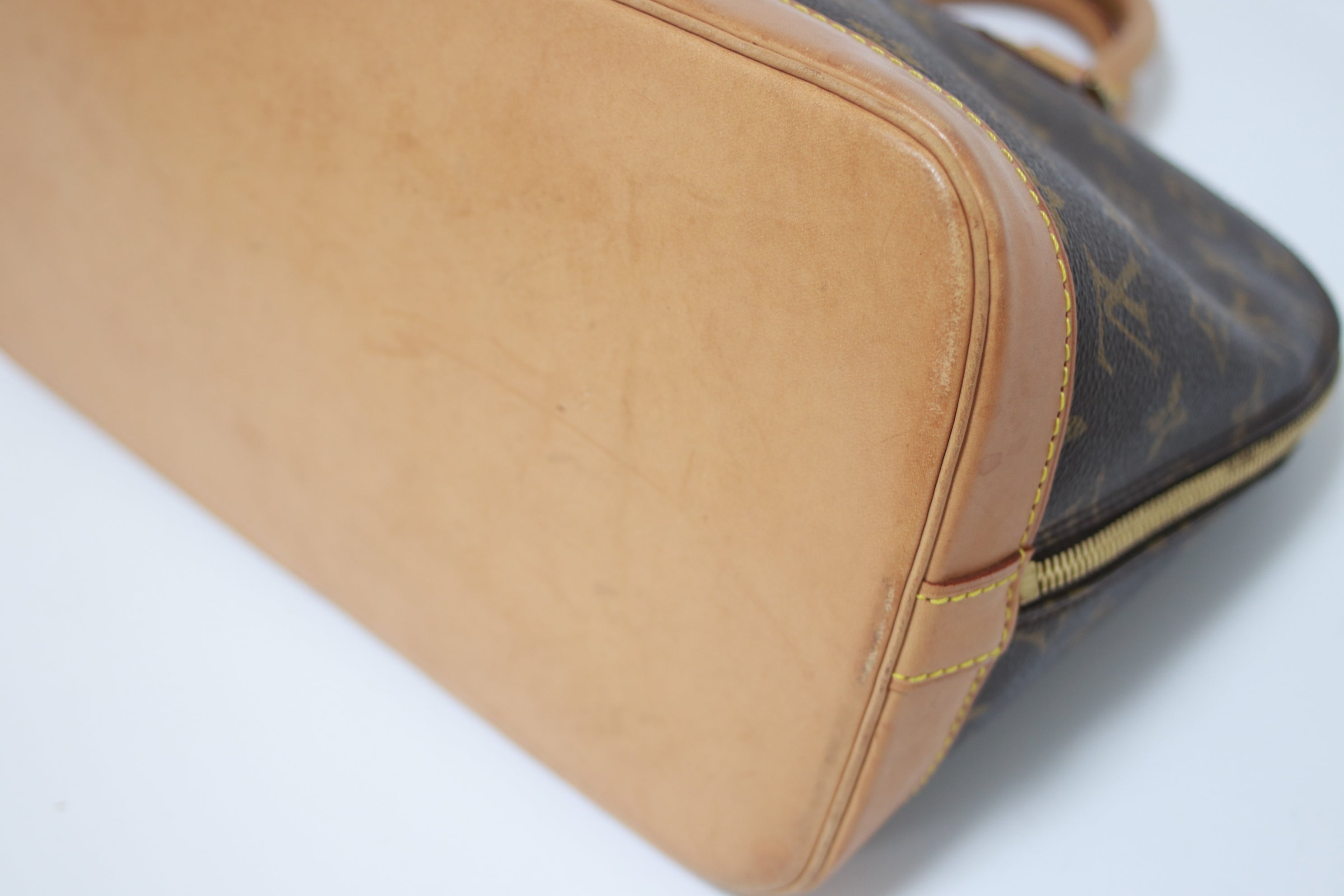 Louis Vuitton Alma PM Handbag Used