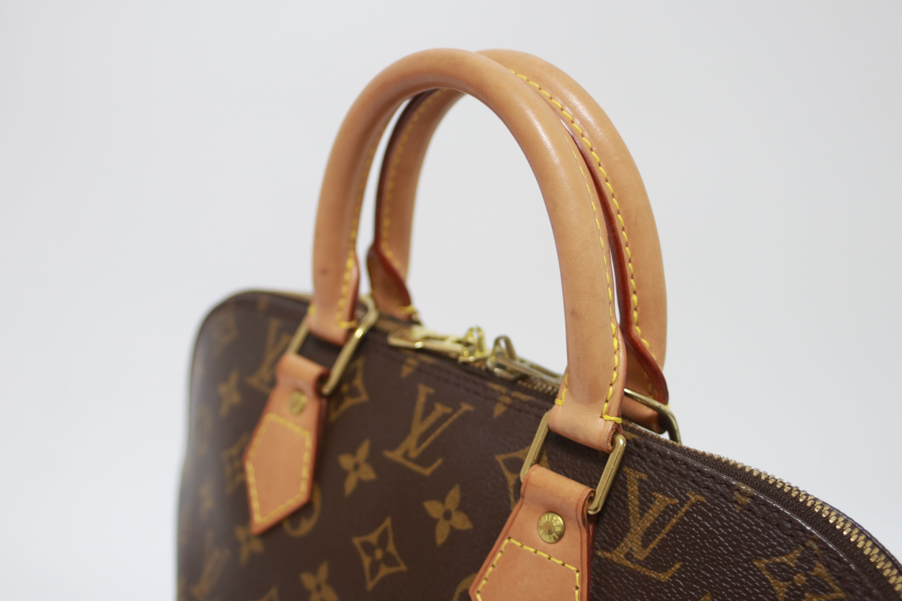 Louis Vuitton Alma PM Handbag Used