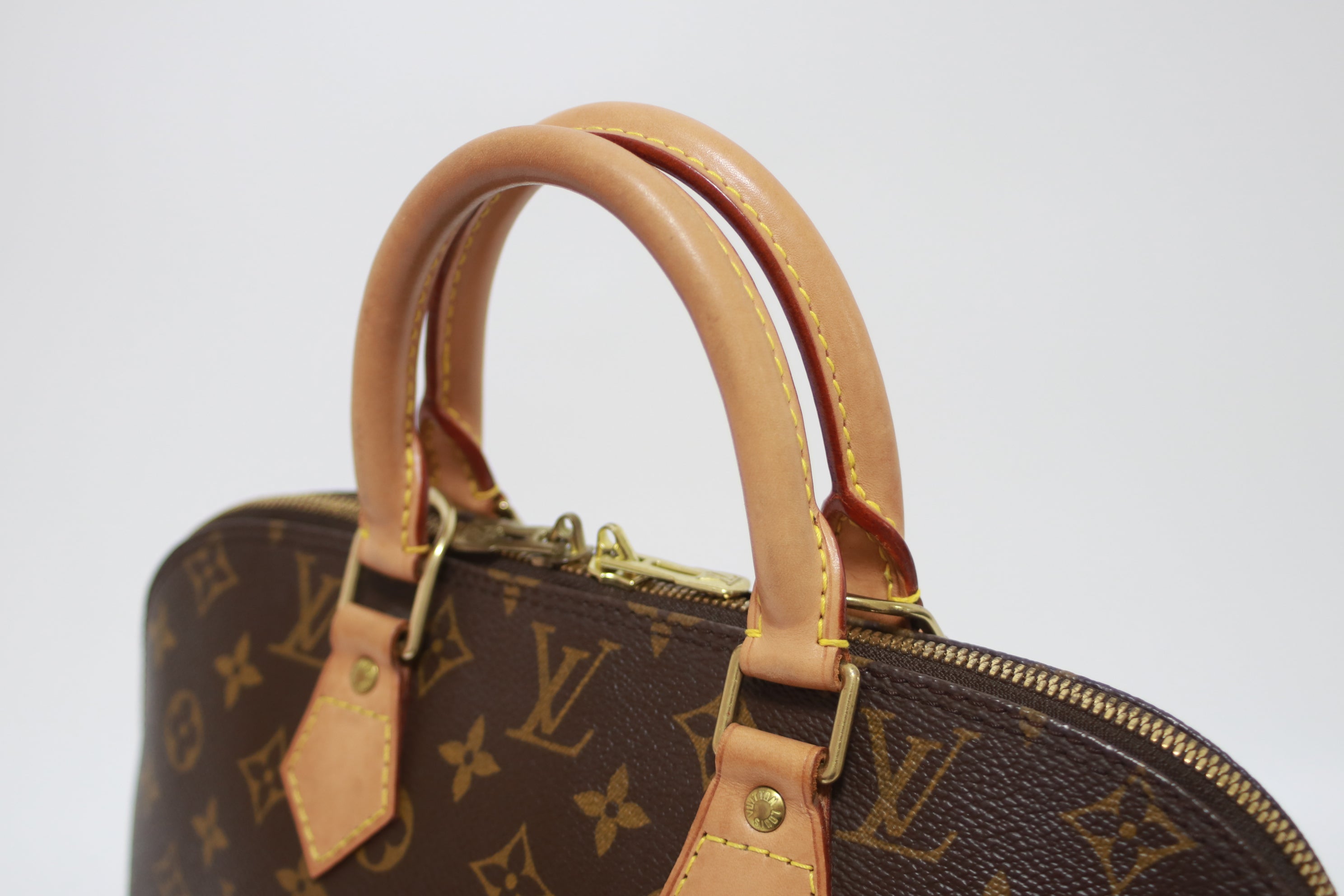 Louis Vuitton Alma PM Handbag Used