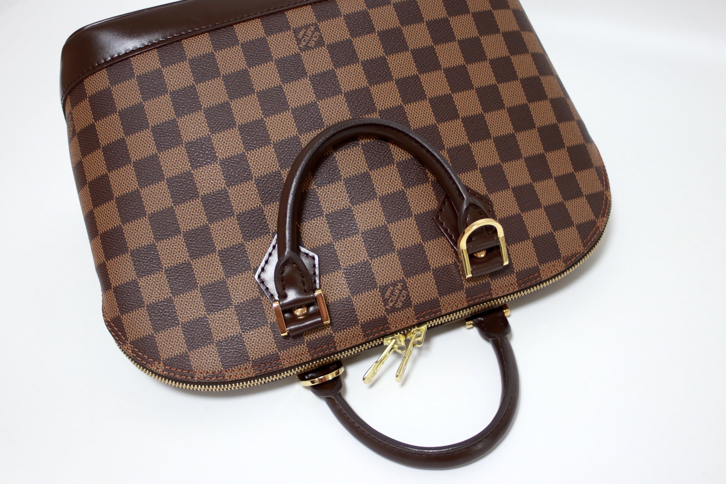 Louis Vuitton Alma PM Damier Ebene Handbag Used