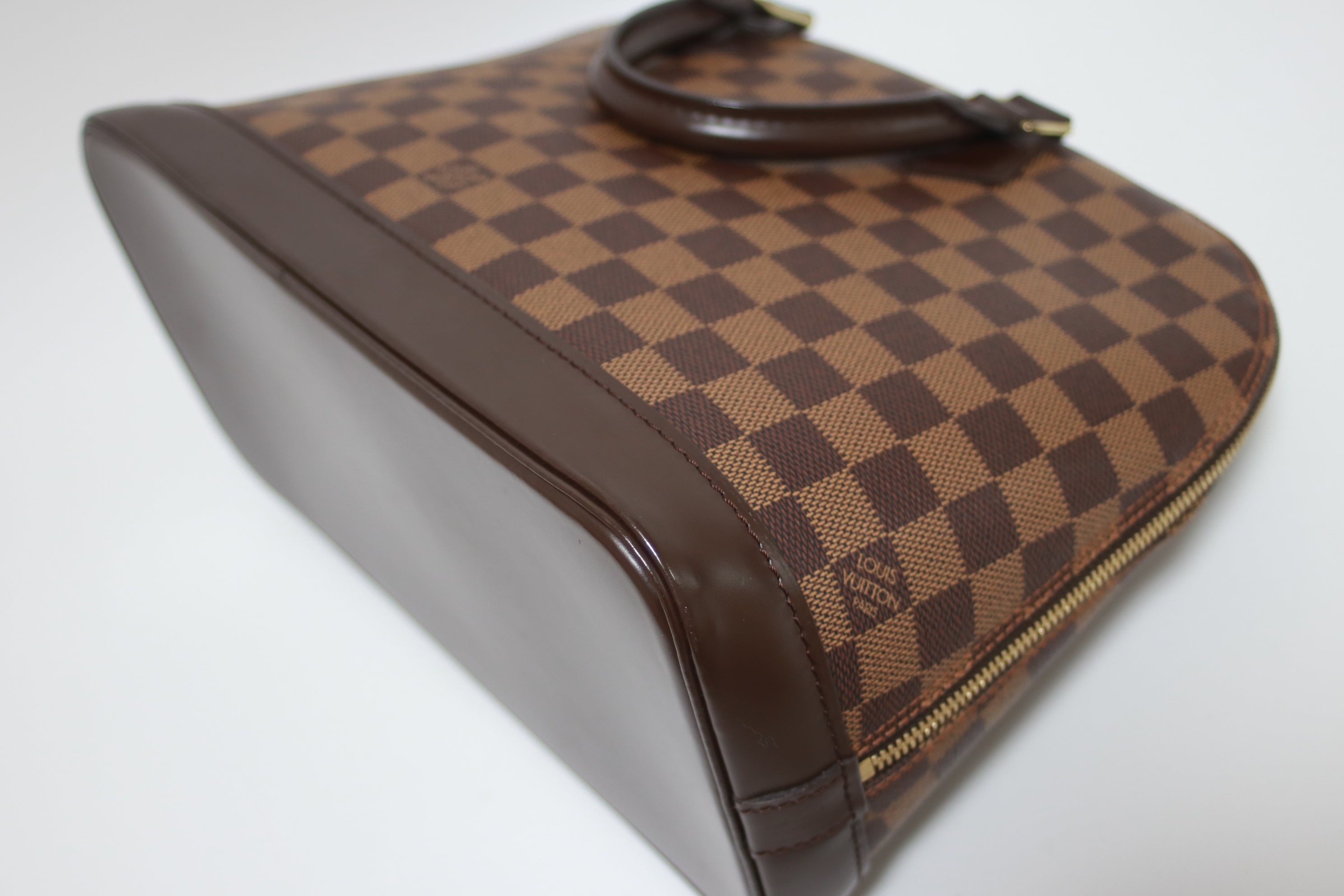 Louis Vuitton Alma Pm Damier Ebene Handbag