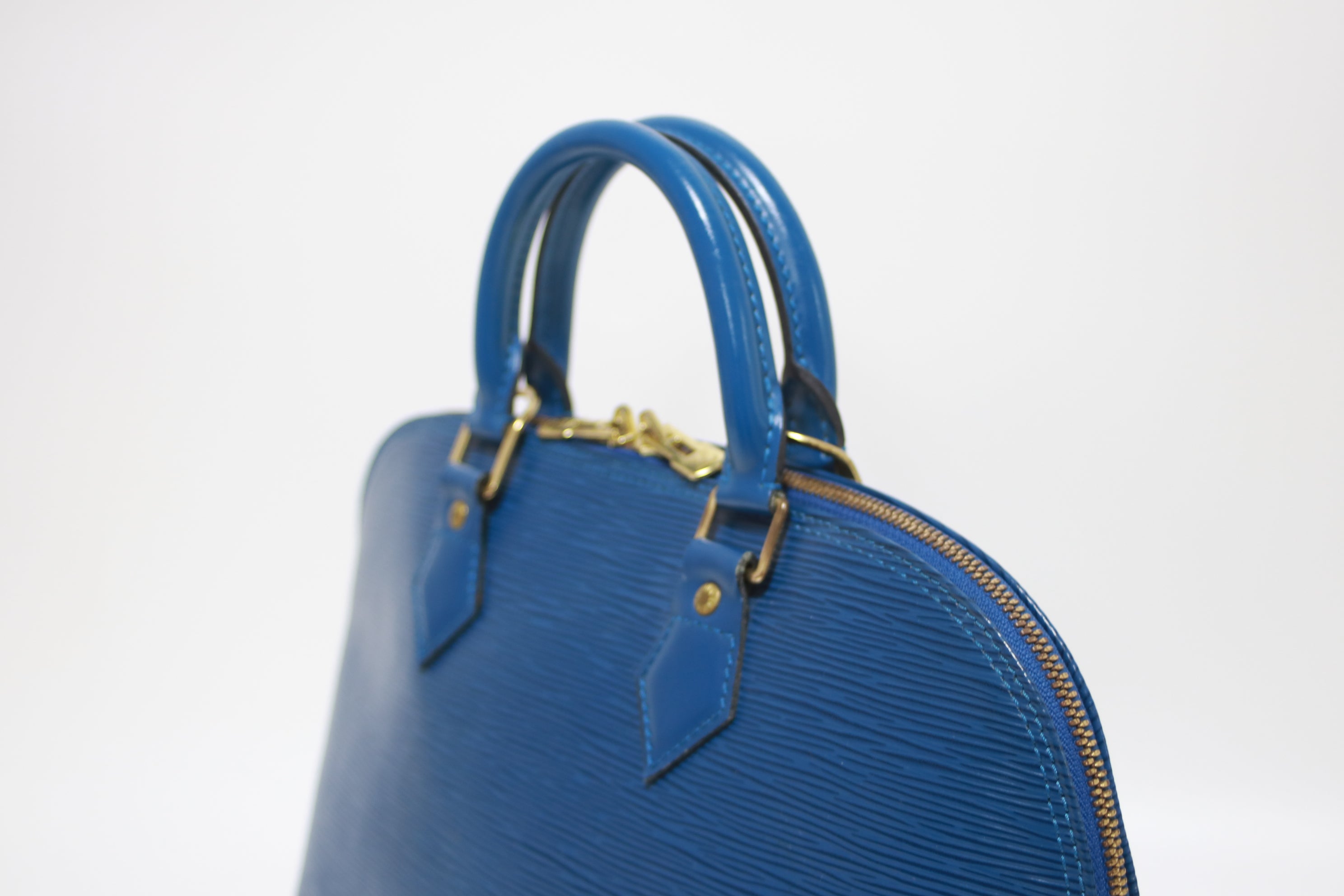 Louis Vuitton Alma Epi Blue Used