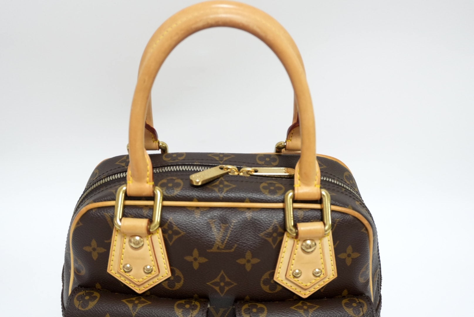 Louis offers Vuitton Monogram Manhattan PM