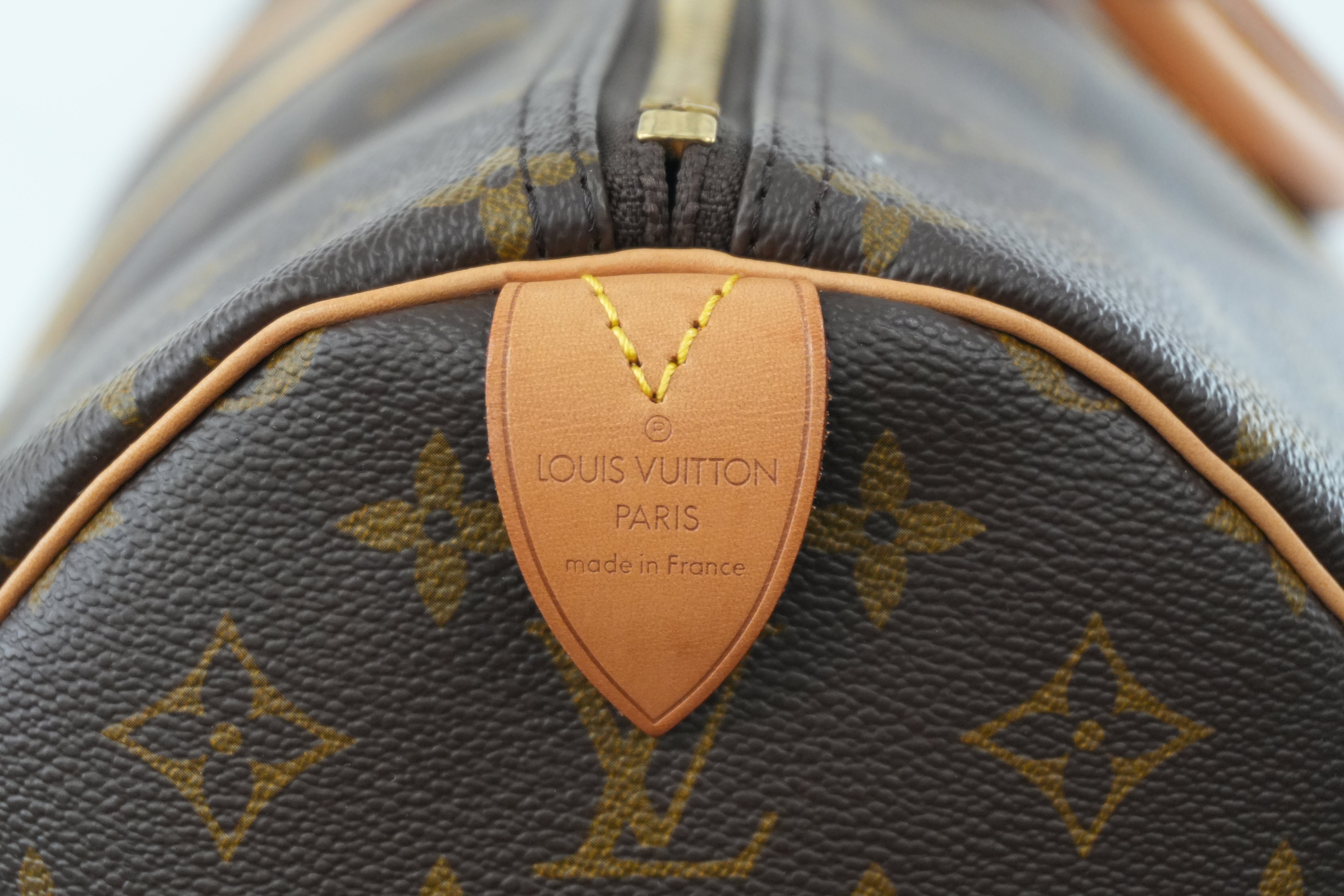 Louis Vuitton Monogram Keepall 60 Duffle Bag Used