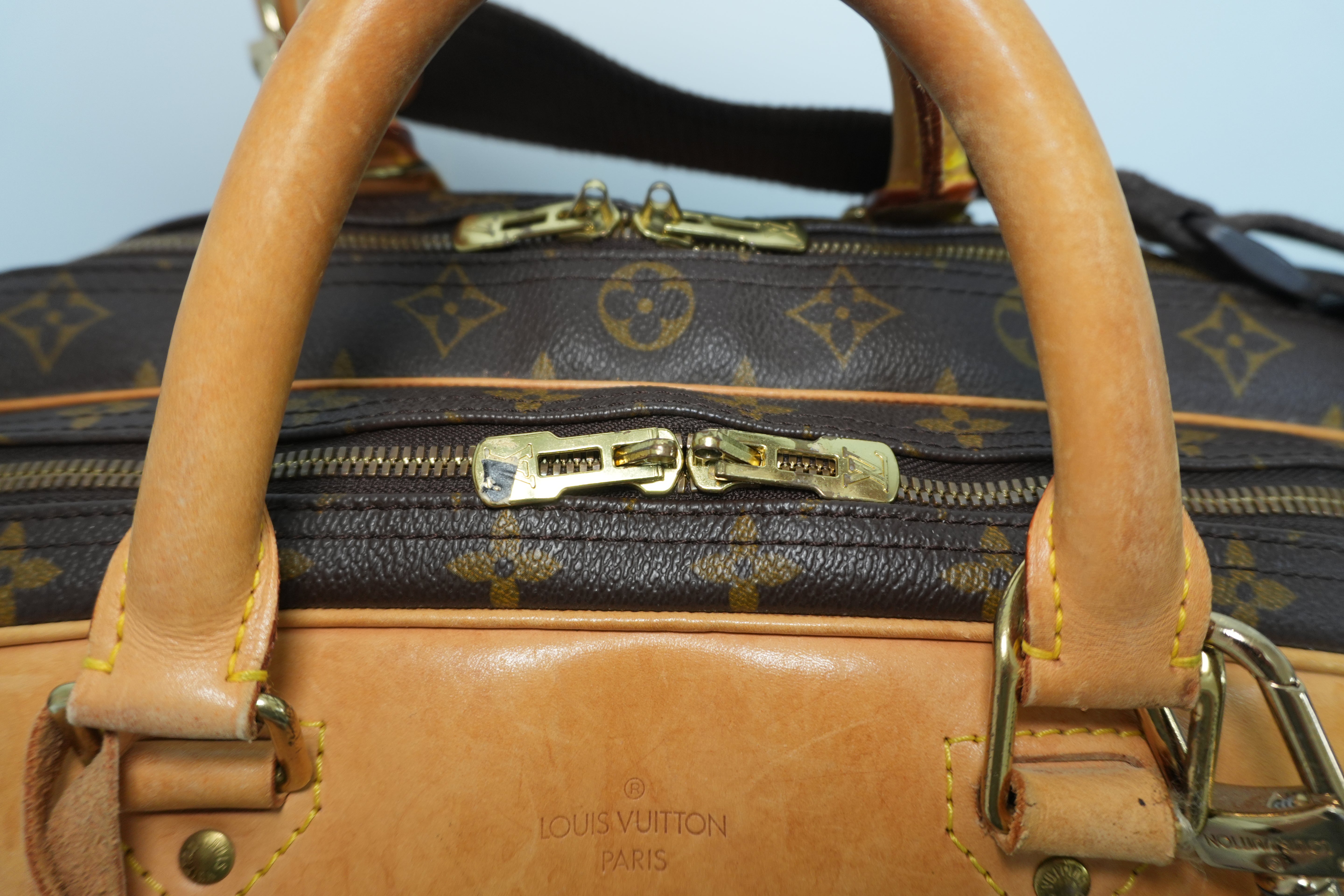 Louis Vuitton Alize 24 Travel Bag Used