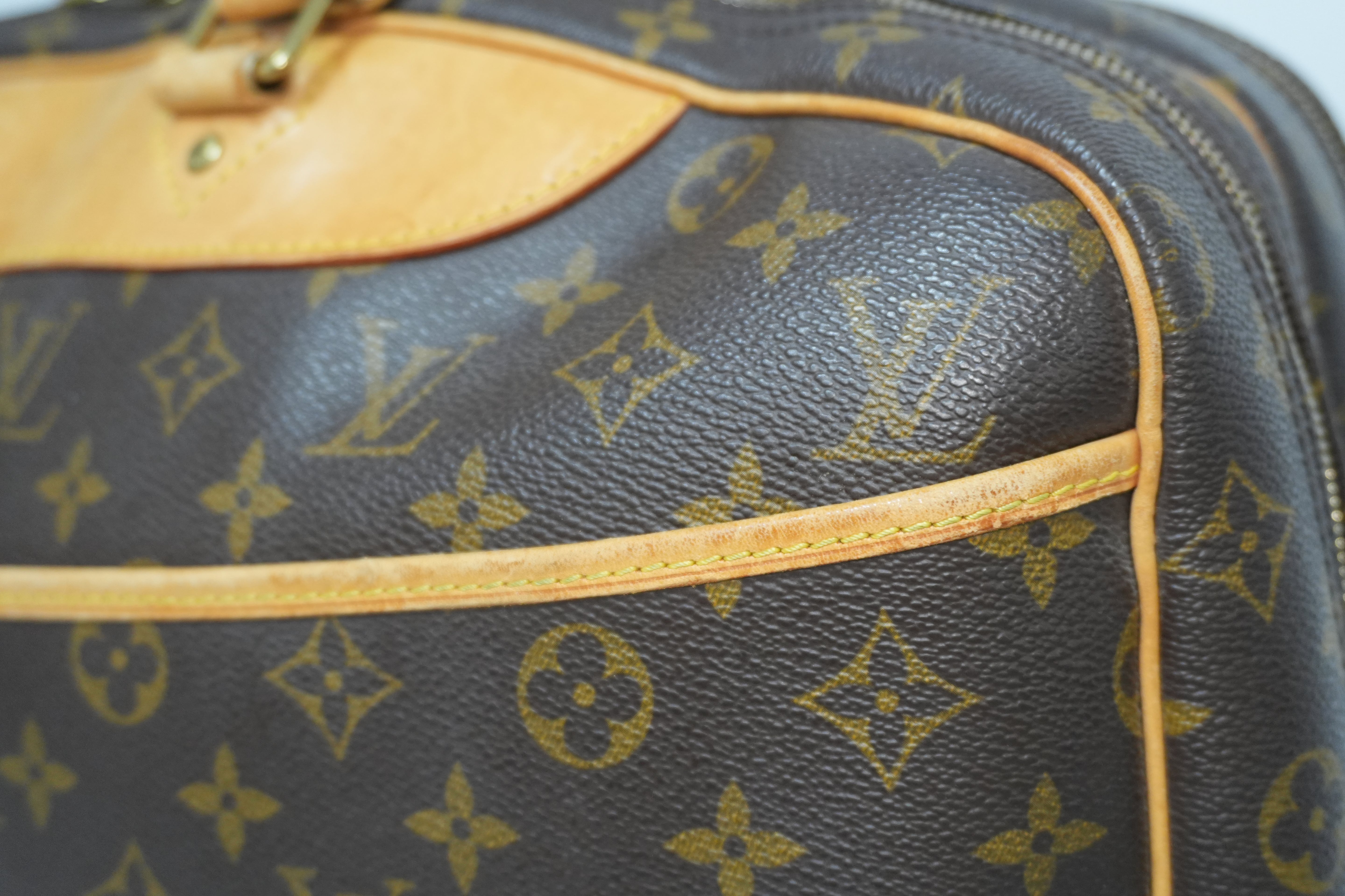 Louis Vuitton Alize 24 Travel Bag Used