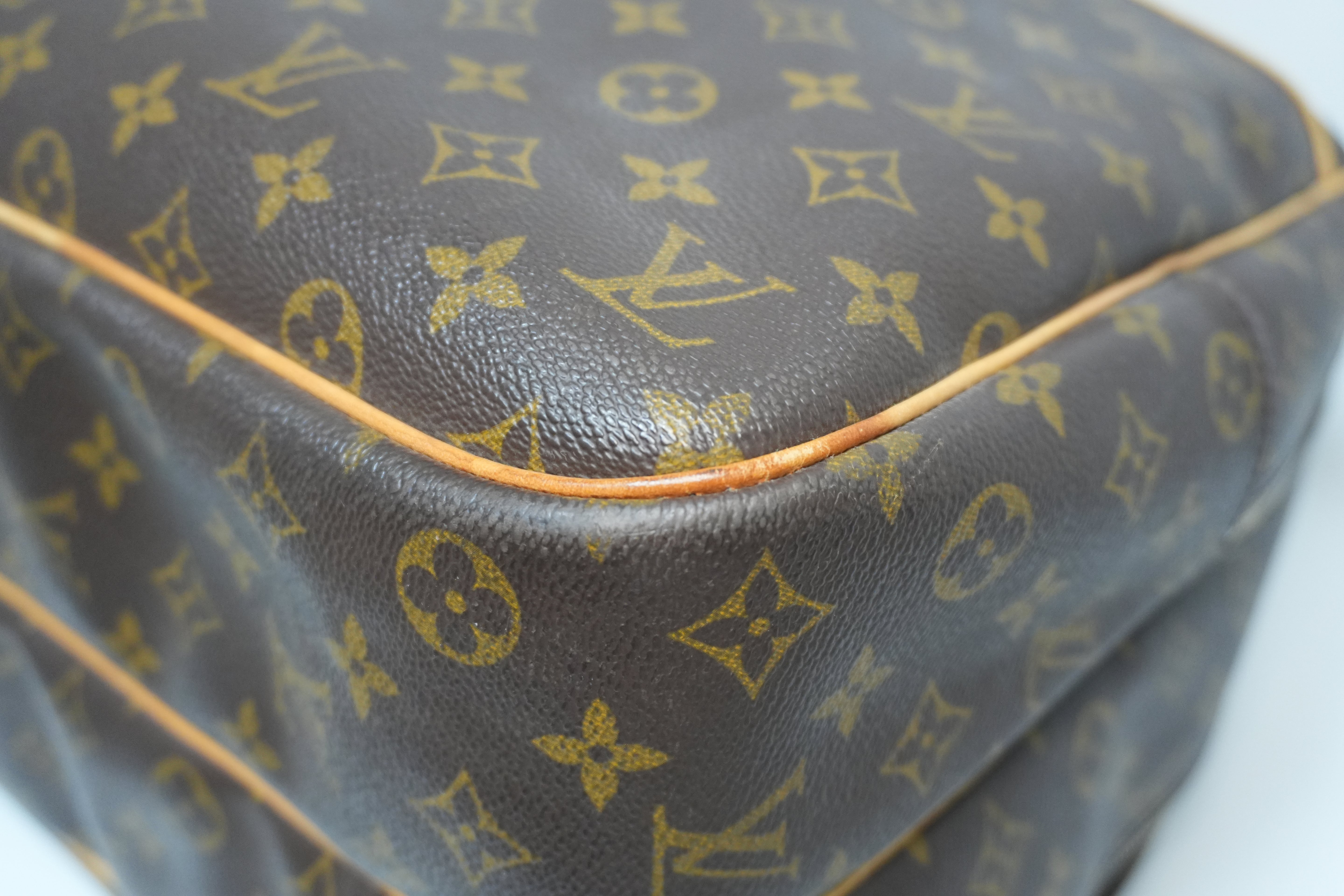 Louis Vuitton Alize 24 Travel Bag Used