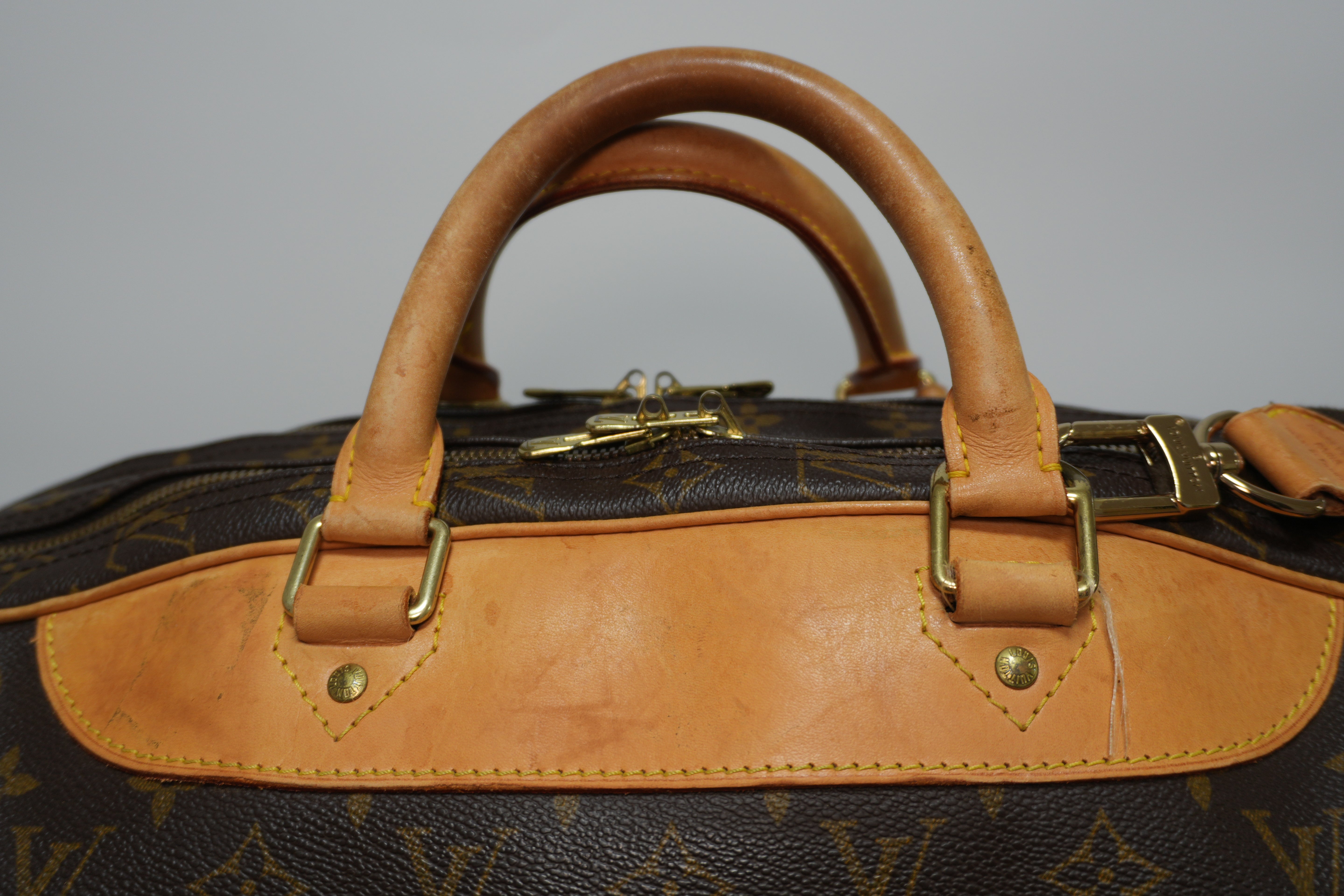 Louis Vuitton Alize 24 Travel Bag Used