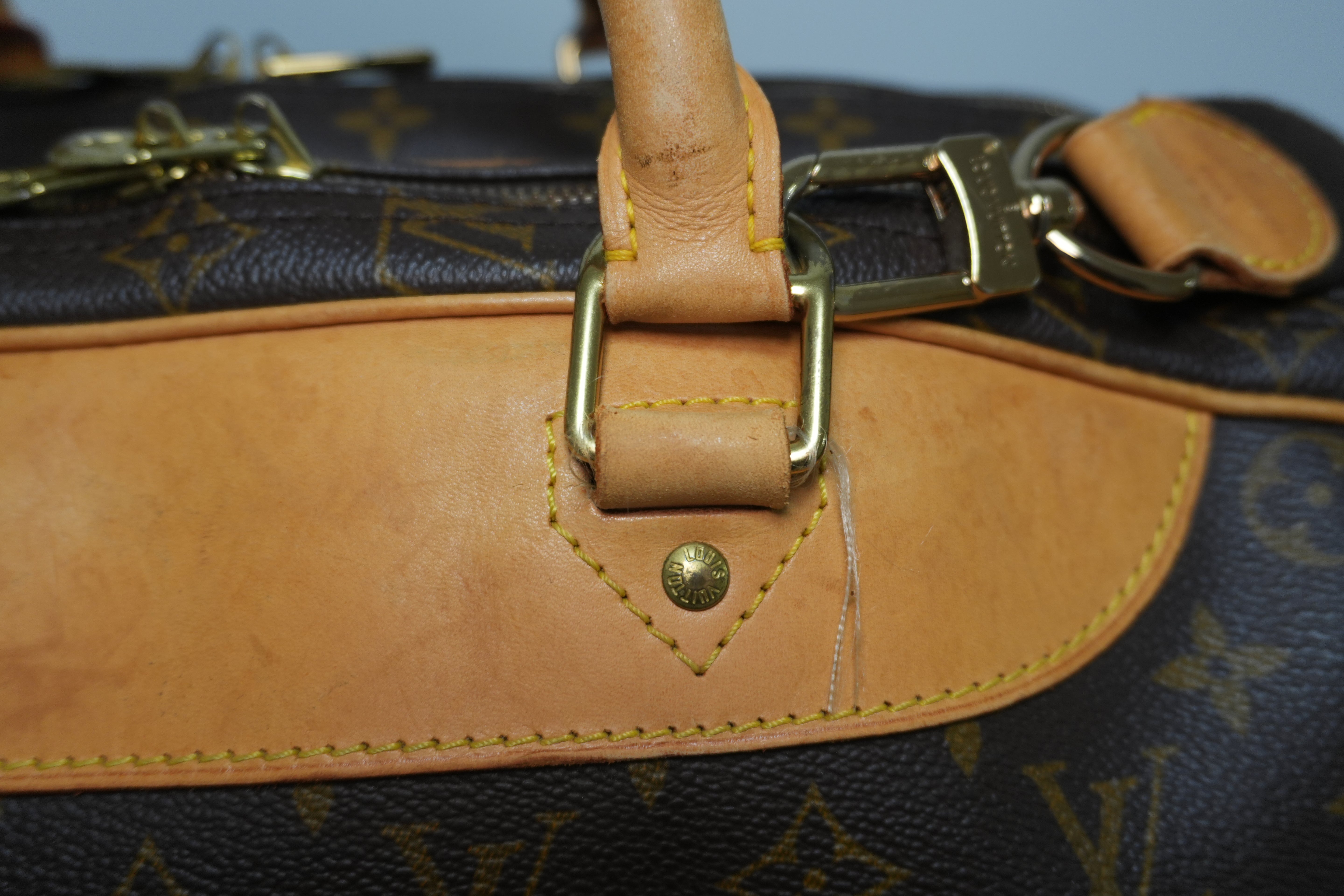 Louis Vuitton Alize 24 Travel Bag Used